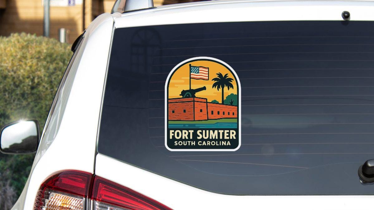 a sticker on the rear window of a white vehicle, depicting a scene with a building, palm trees, and a flag.
