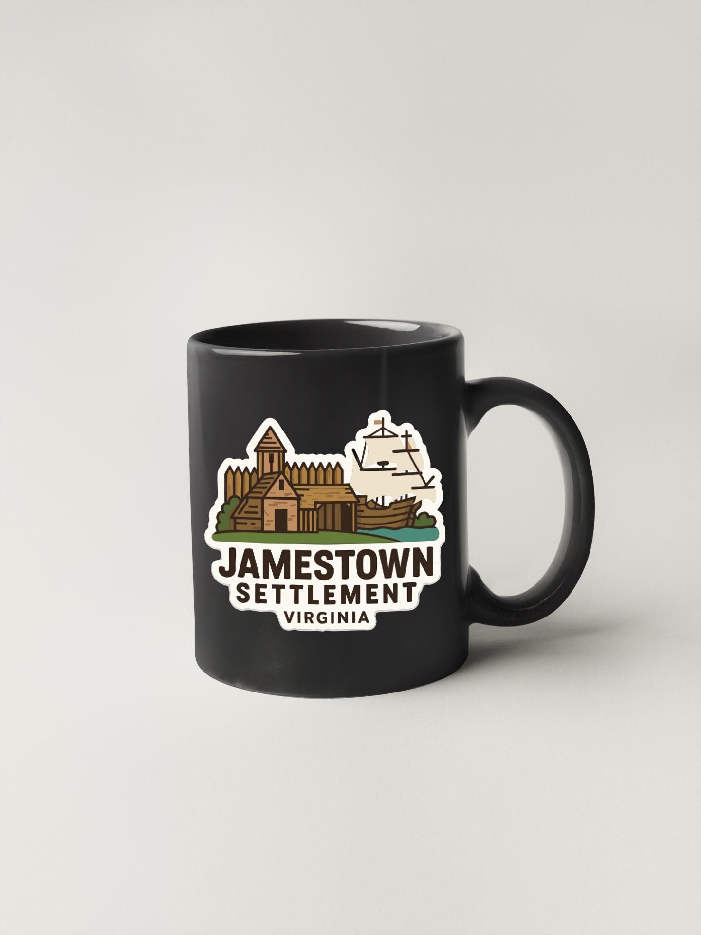 A black coffee mug with a graphic design depicting Jamestown Settlement, Virginia.