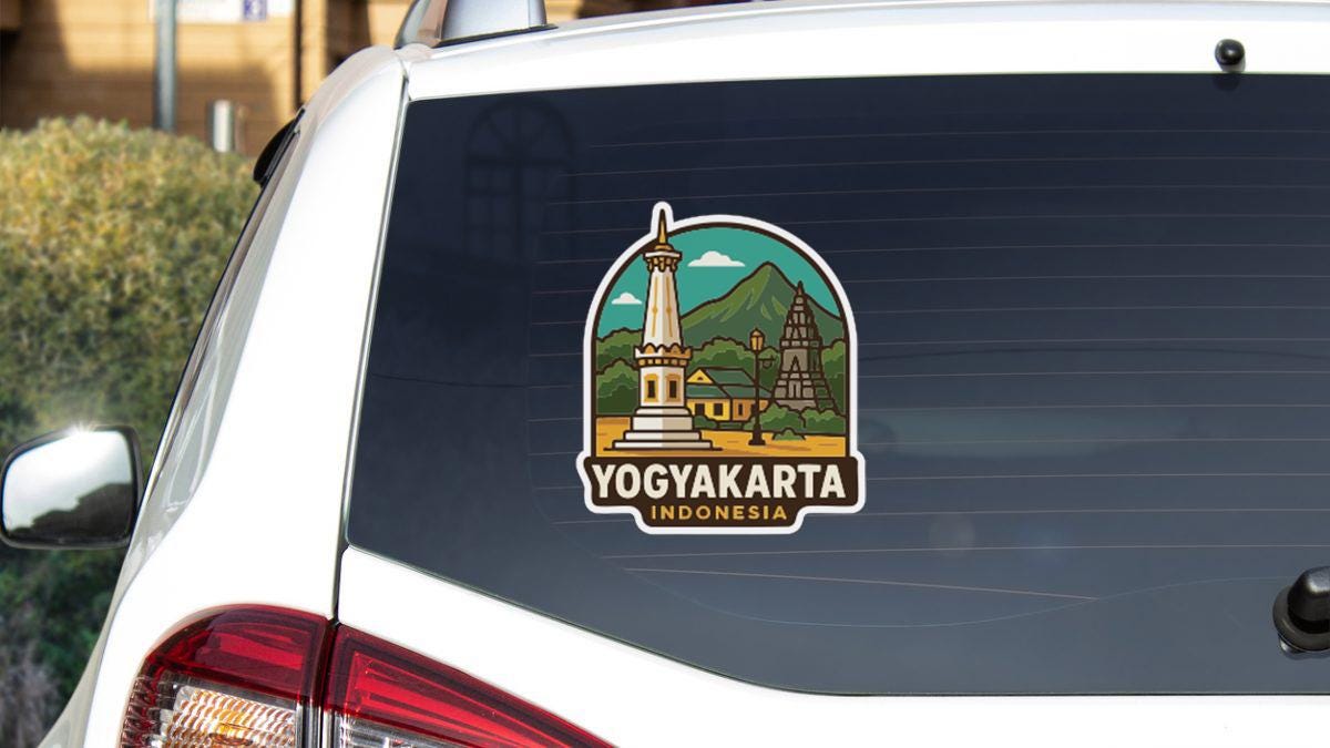a sticker on the rear window of a car that displays the name "YOGYAKARTA INDONESIA".