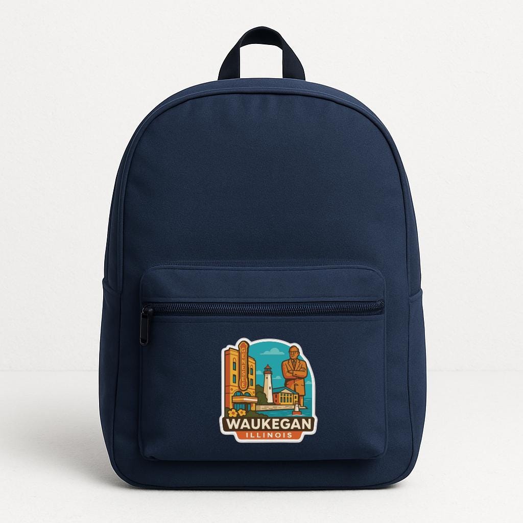 A navy blue backpack with a sticker on the front that says "Waukegan Illinois".