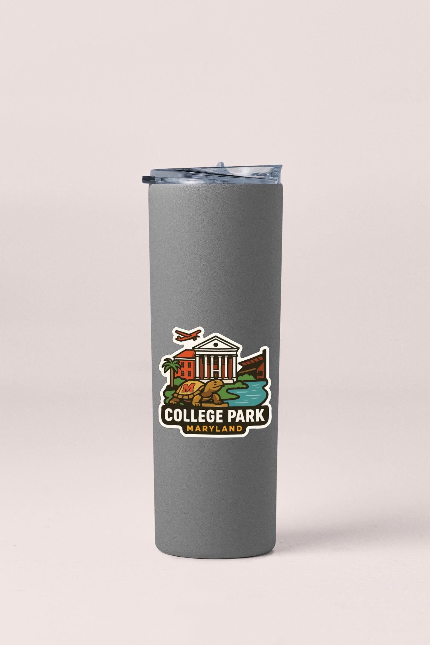 A gray insulated tumbler with a printed logo that says "COLLEGE PARK MARYLAND".