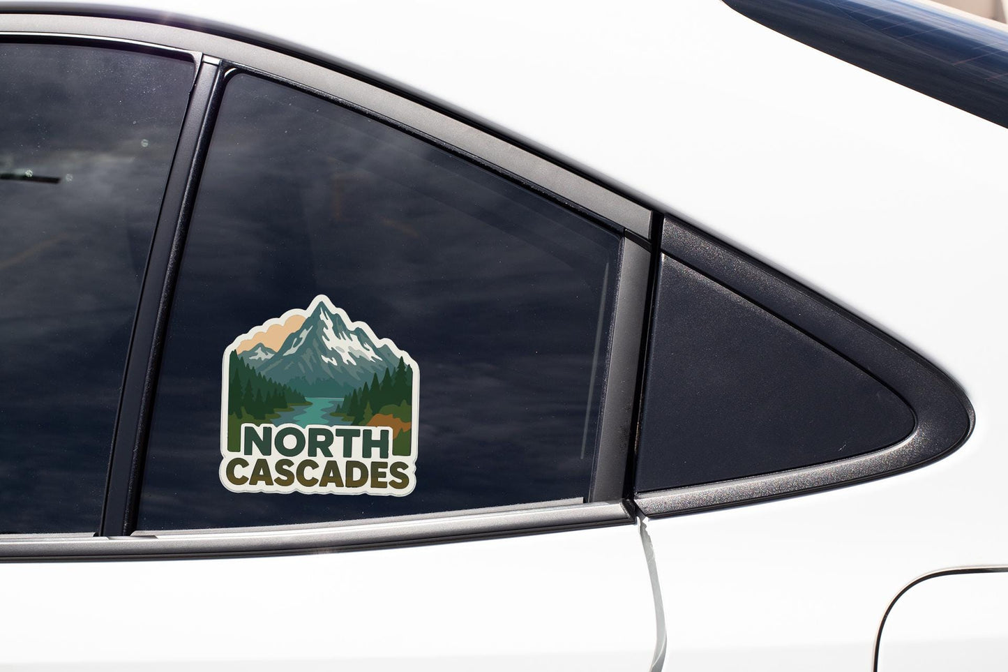 A car window with a sticker that says "NORTH CASCADES".