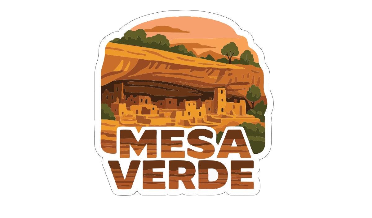 a desert landscape with a cliff, buildings, and trees.