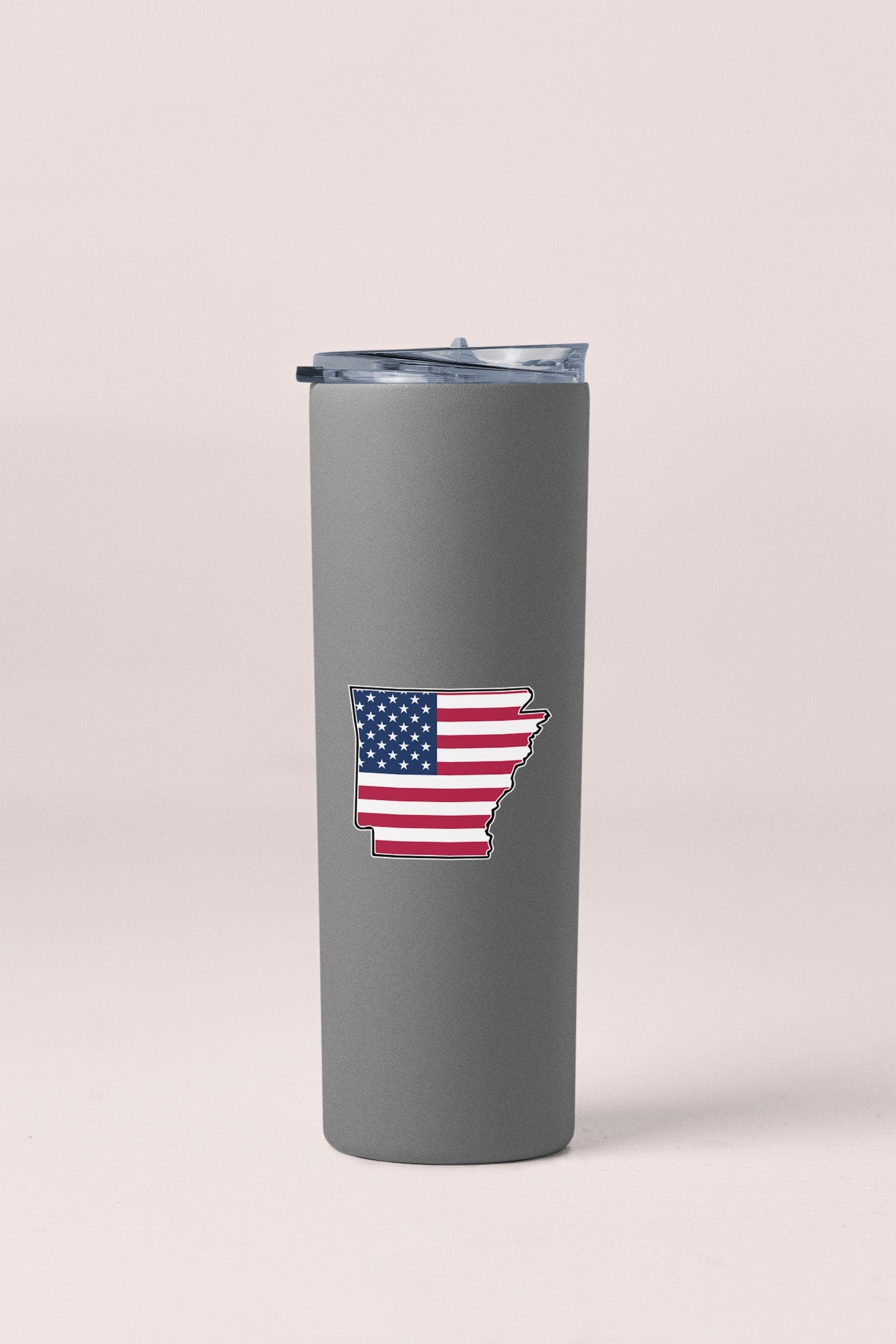 a stainless steel tumbler with the shape of the united states of america painted on