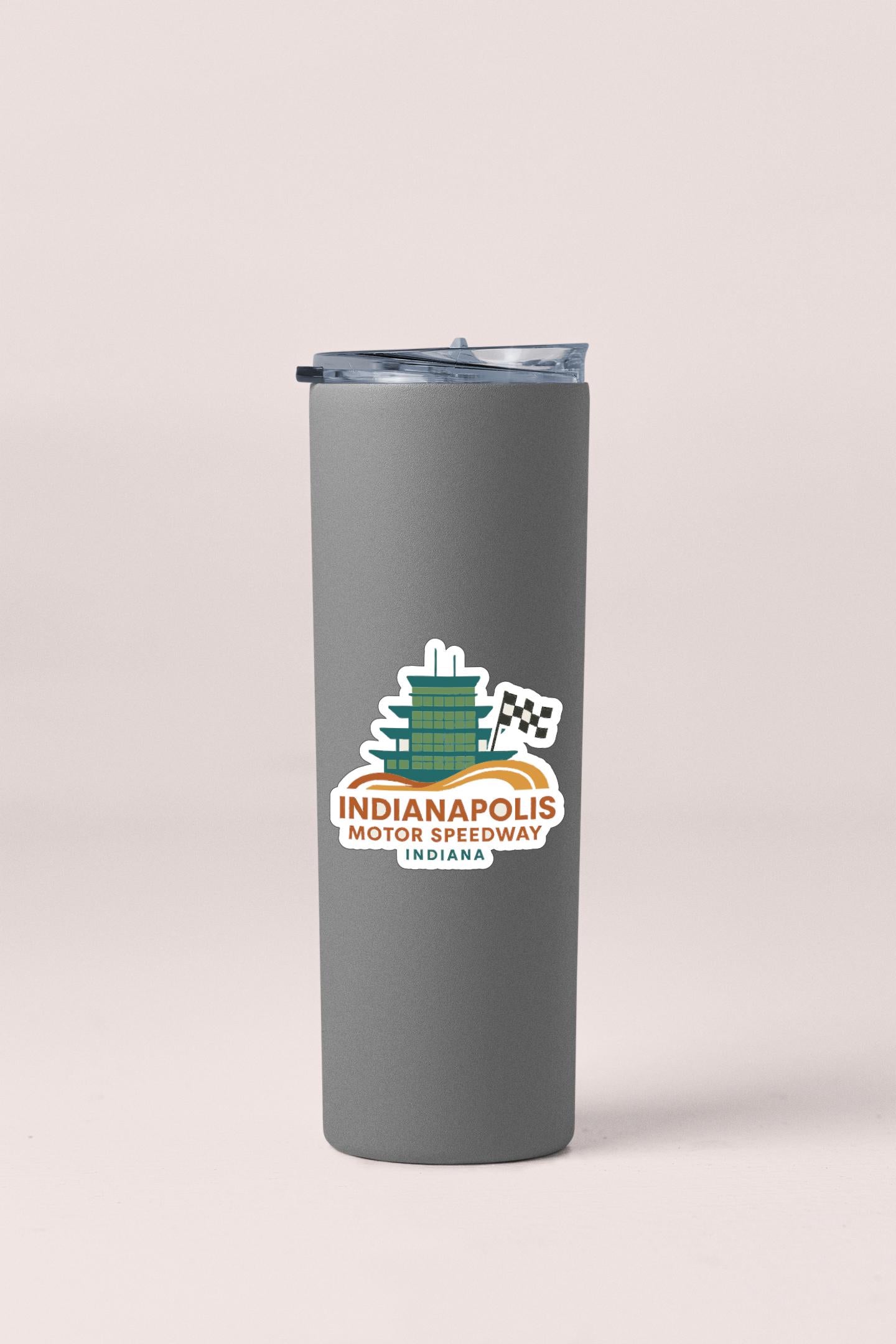 A gray insulated tumbler with a logo for Indianapolis Motor Speedway in Indiana.