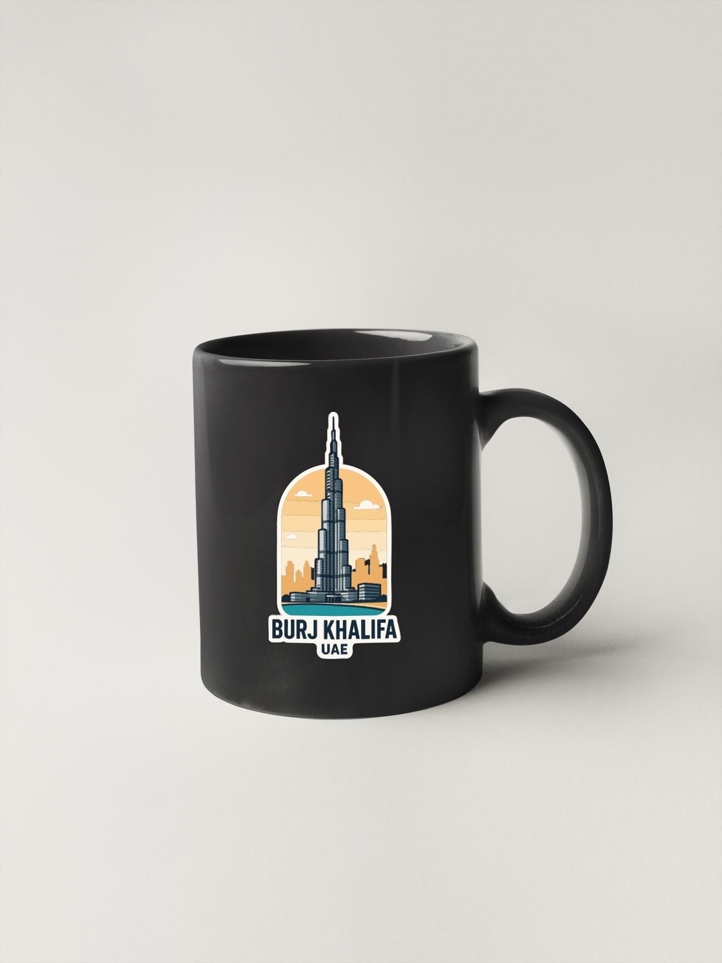 A black coffee mug with a graphic of the Burj Khalifa, the tallest building in the world, and the text "BURJ KHAIFA UAE" printed on it.