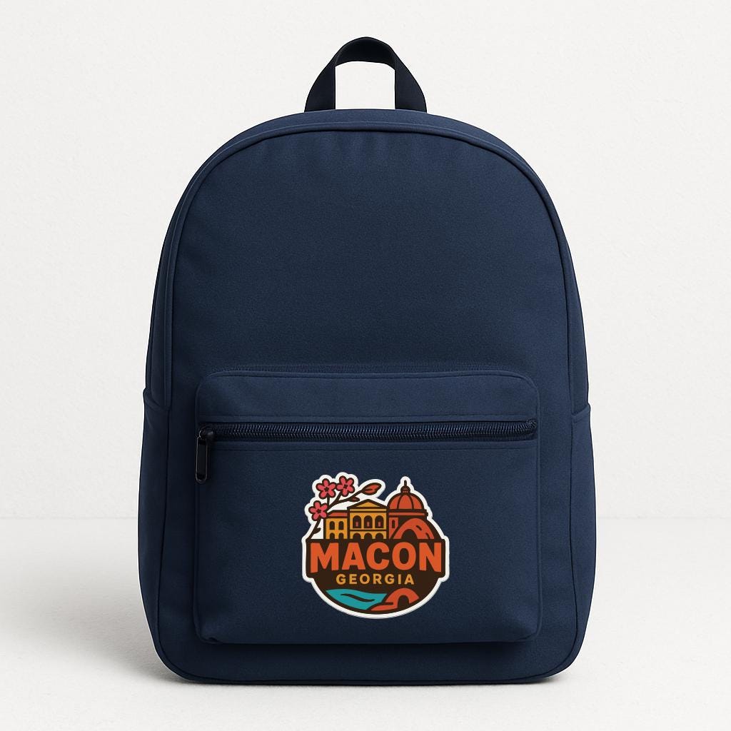 A navy blue backpack with a graphic of the city of Macon, Georgia, printed on it.