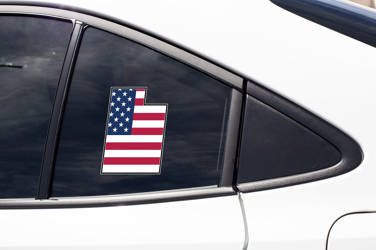 an american flag sticker on the side of a car