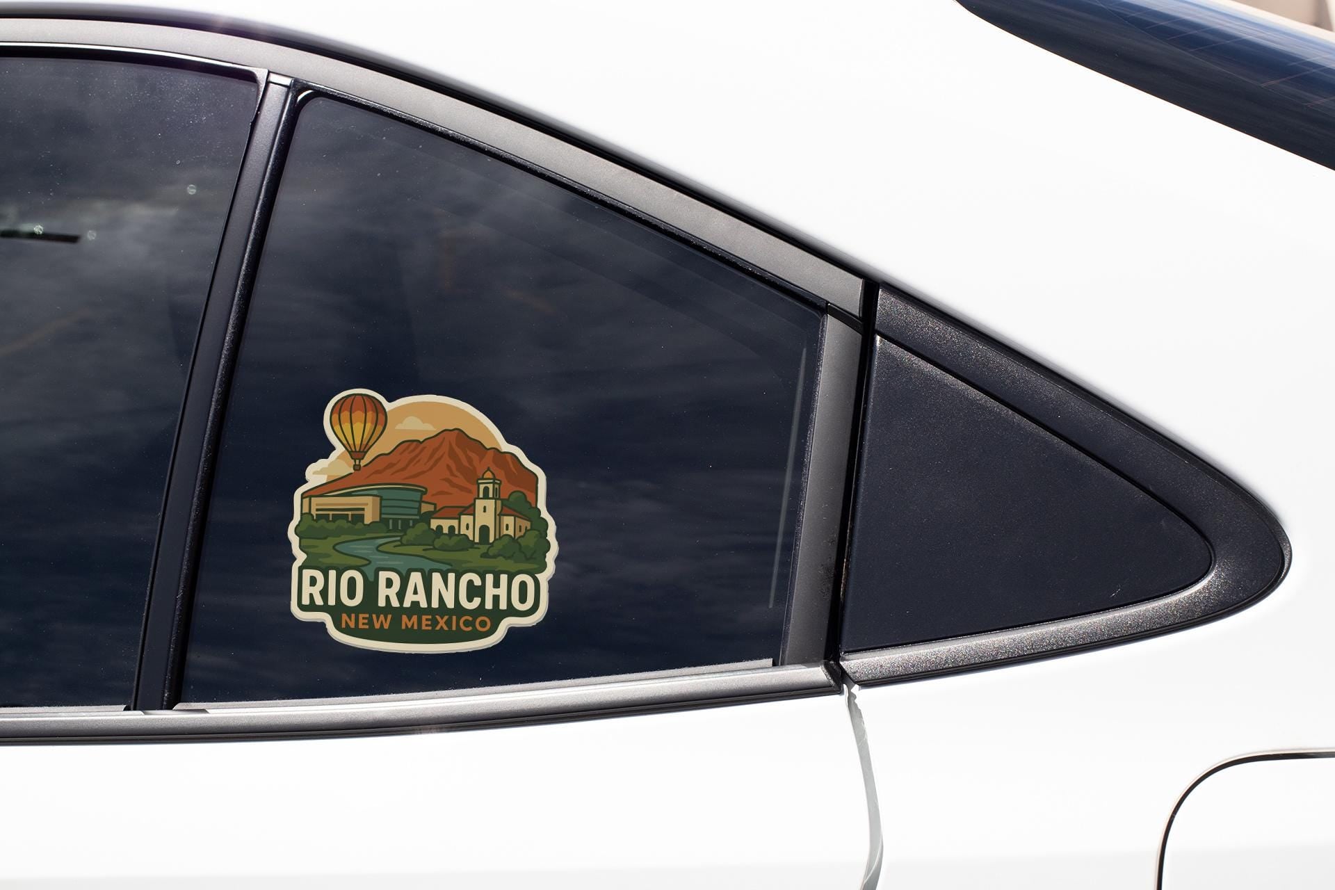 A sticker on the side of a car window that says "Rio Rancho, New Mexico".
