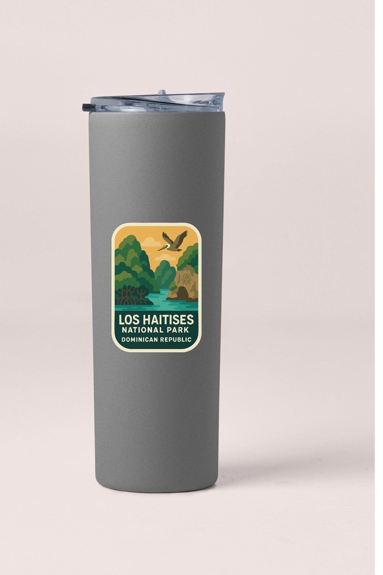 A gray insulated tumbler with a label that says "LOS HAITISES NATIONAL PARK DIMINICAN REPUBLIC".