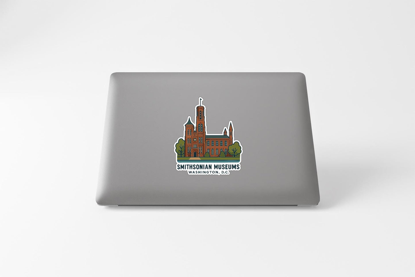 A sticker on the back of a laptop displaying an illustration of a building and the text "SMITHsonian Museums Washington, D.C."