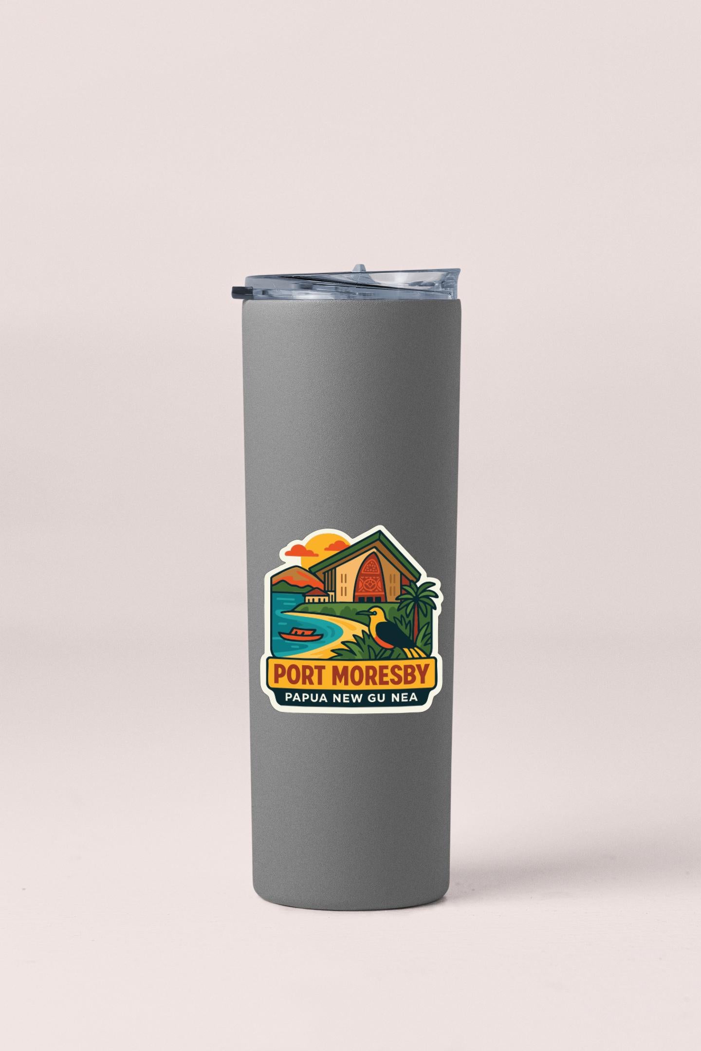 A gray insulated tumbler with a printed label that says "PORT MORESBY PAPUA NEW GUY NEA".