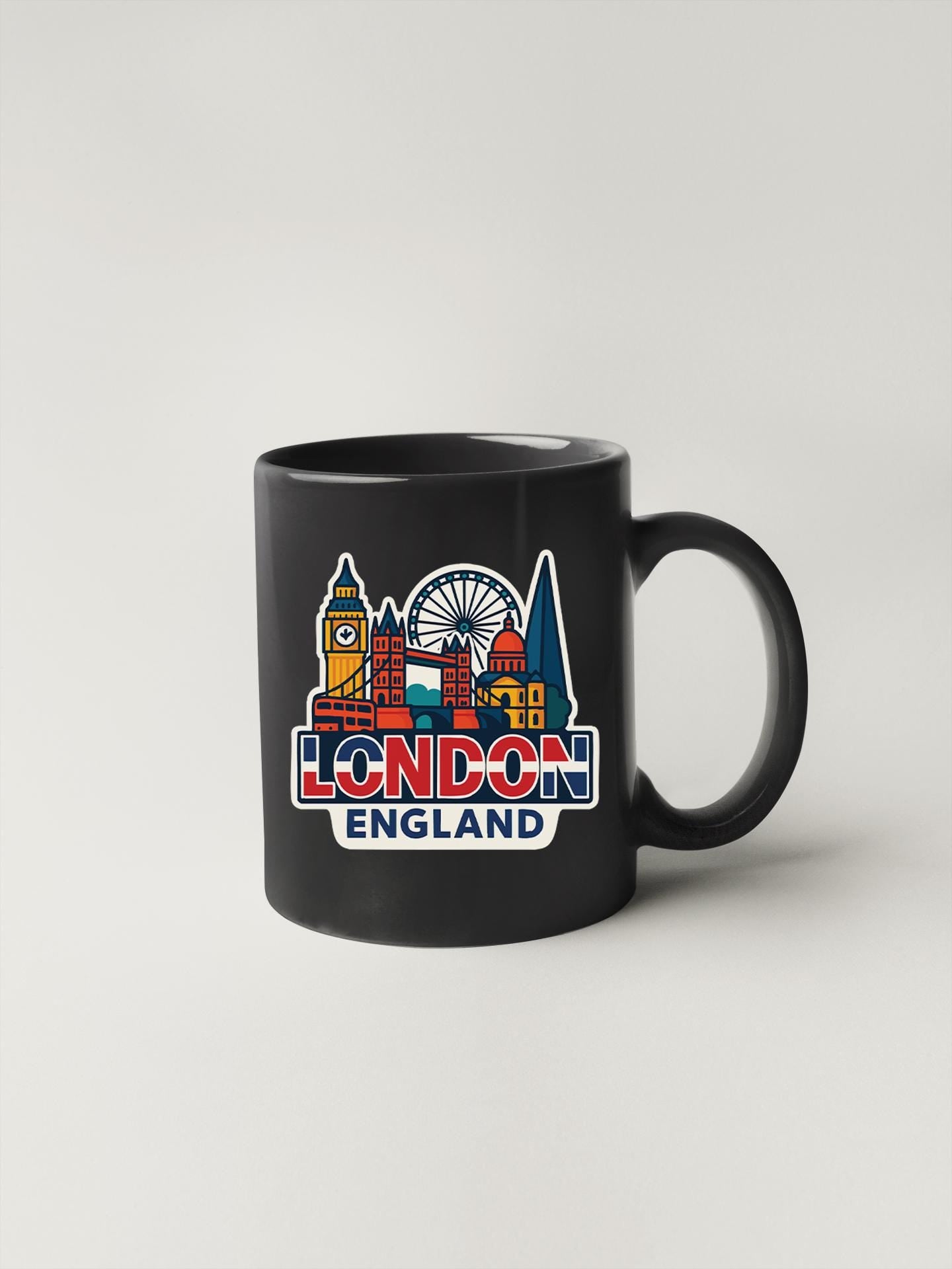 a black mug with the london england skyline on it