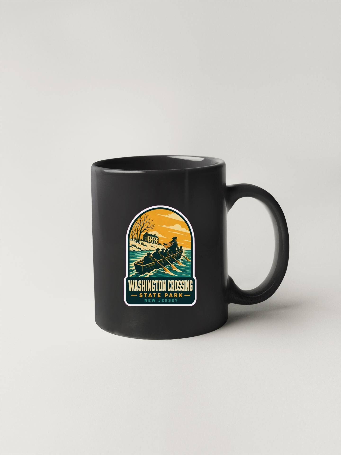 A black coffee mug with a graphic design depicting a person rowing a boat on a lake, surrounded by trees and a lighthouse.