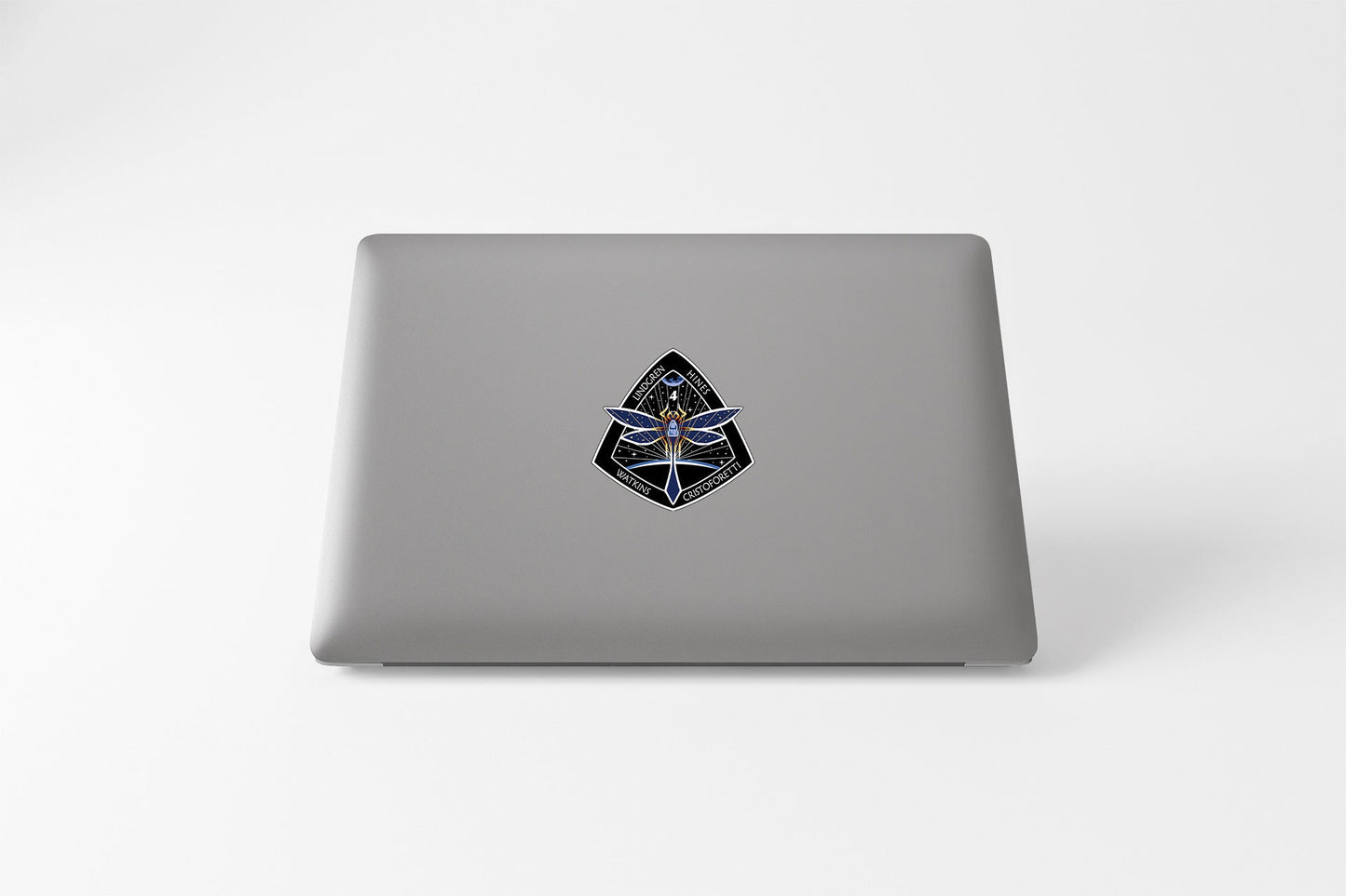 a laptop with a picture of a face on it