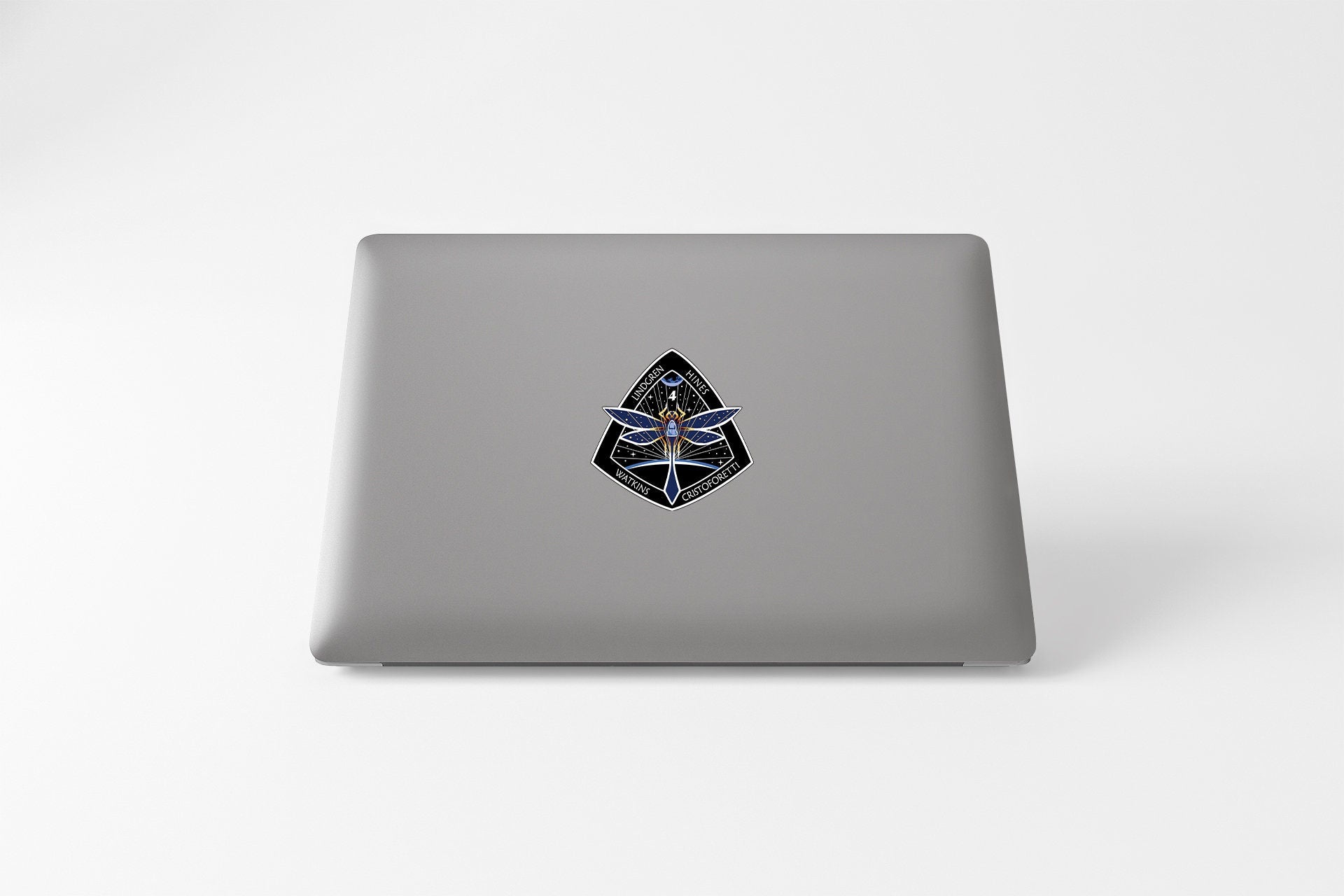 a laptop with a picture of a face on it