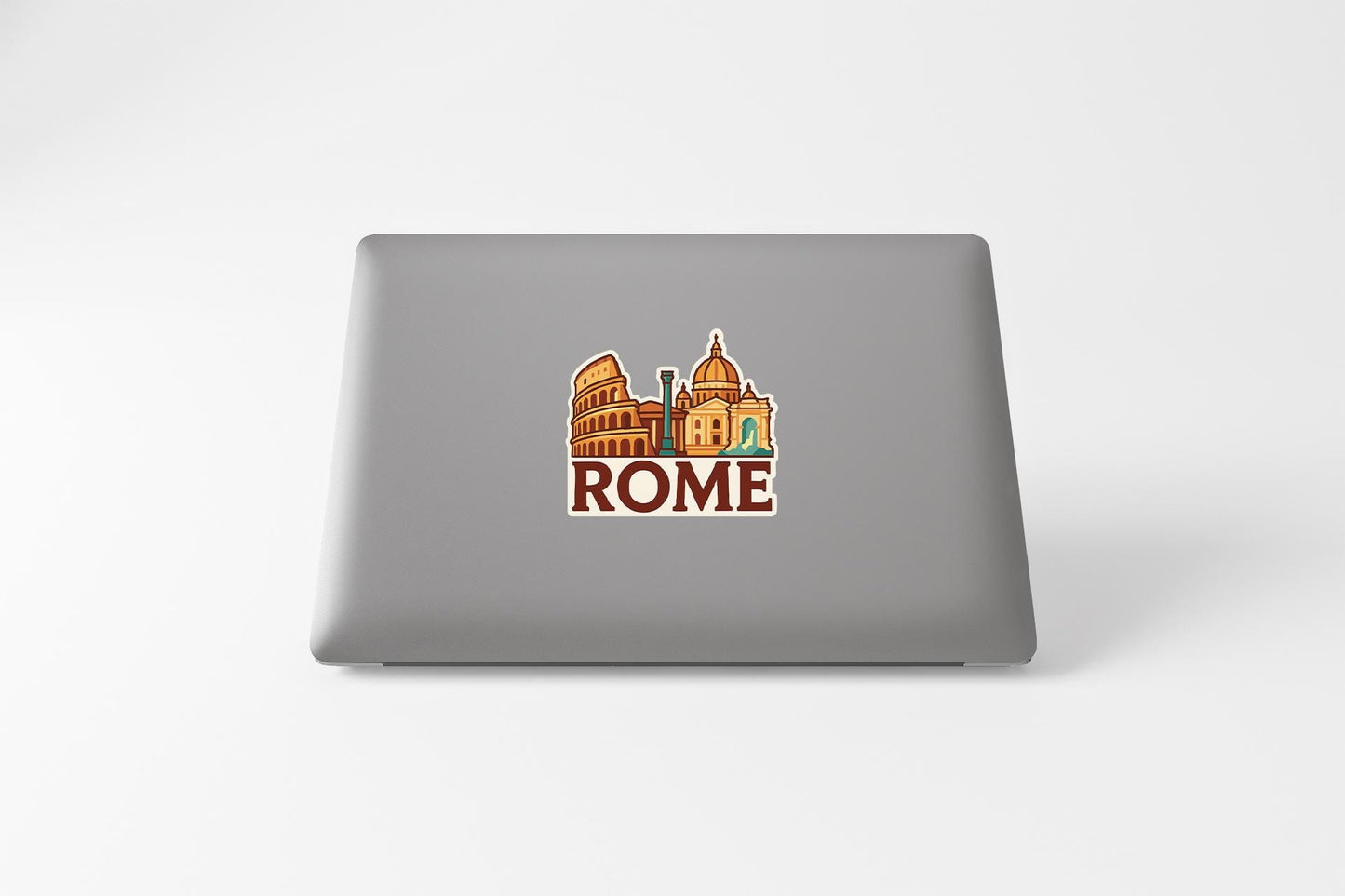 a laptop with a sticker of a city skyline