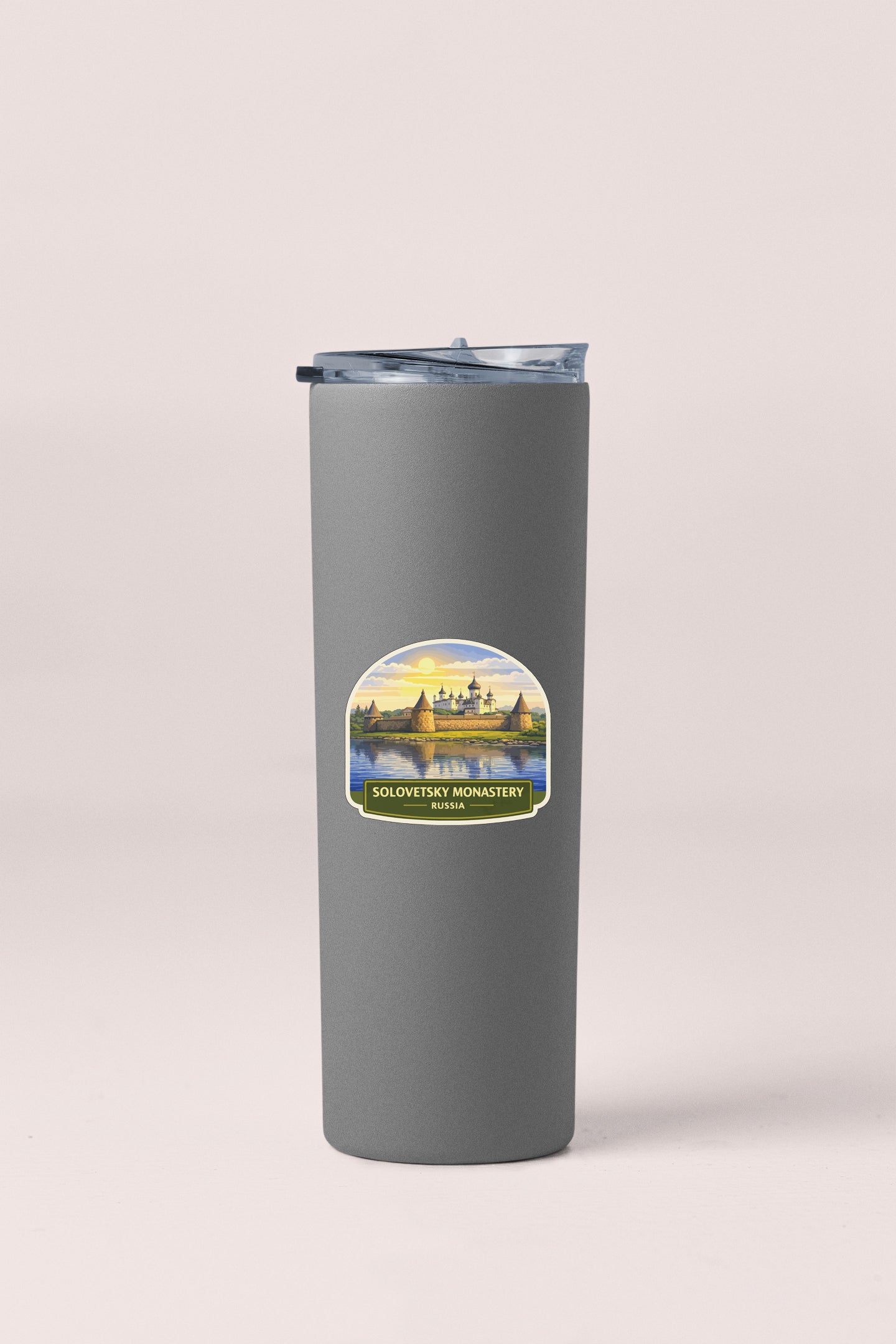 A gray insulated tumbler with a label that says "Solovitsky Monastery Russia".