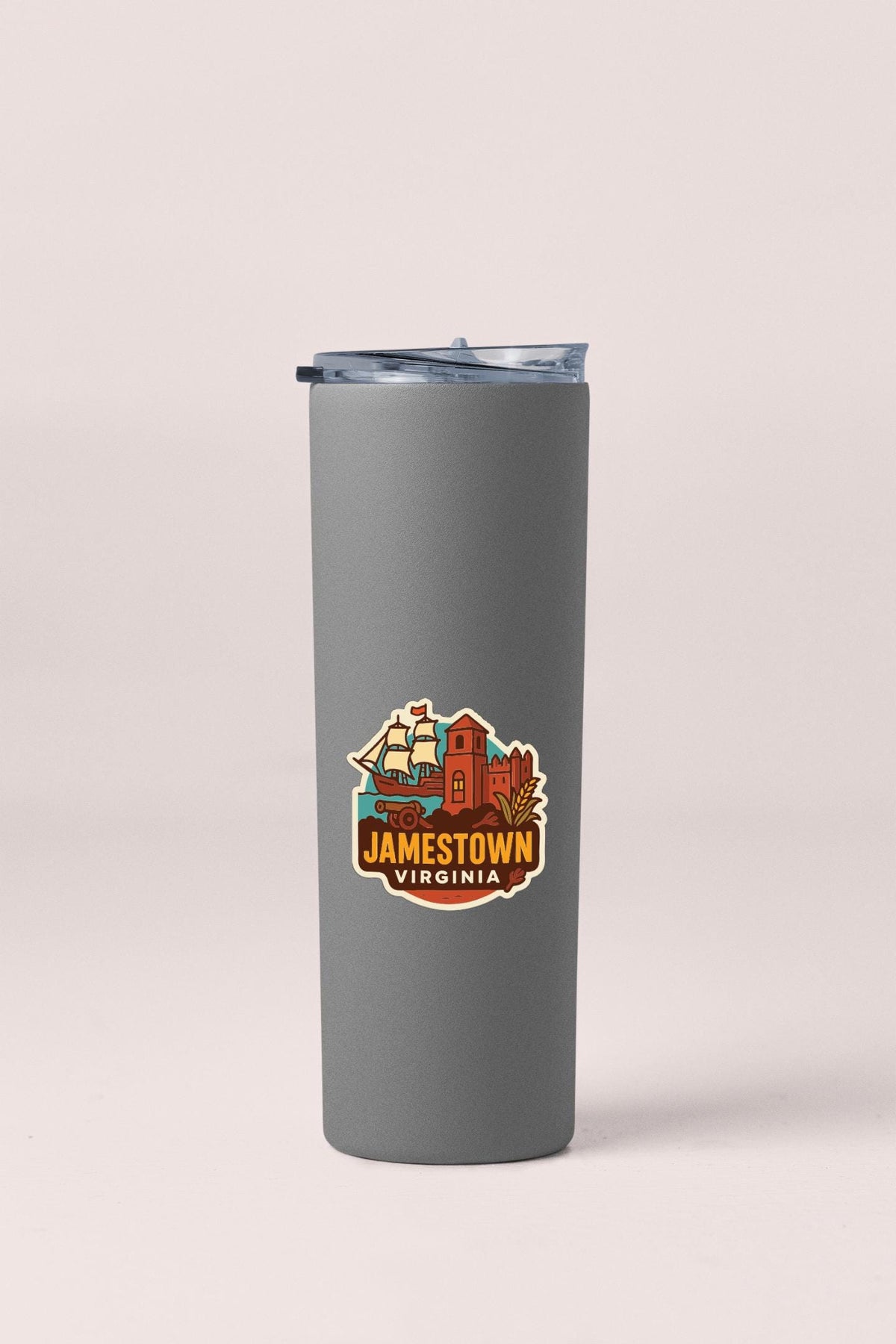 A gray insulated tumbler with a lid and a sticker featuring an illustration of Jamestown, Virginia.