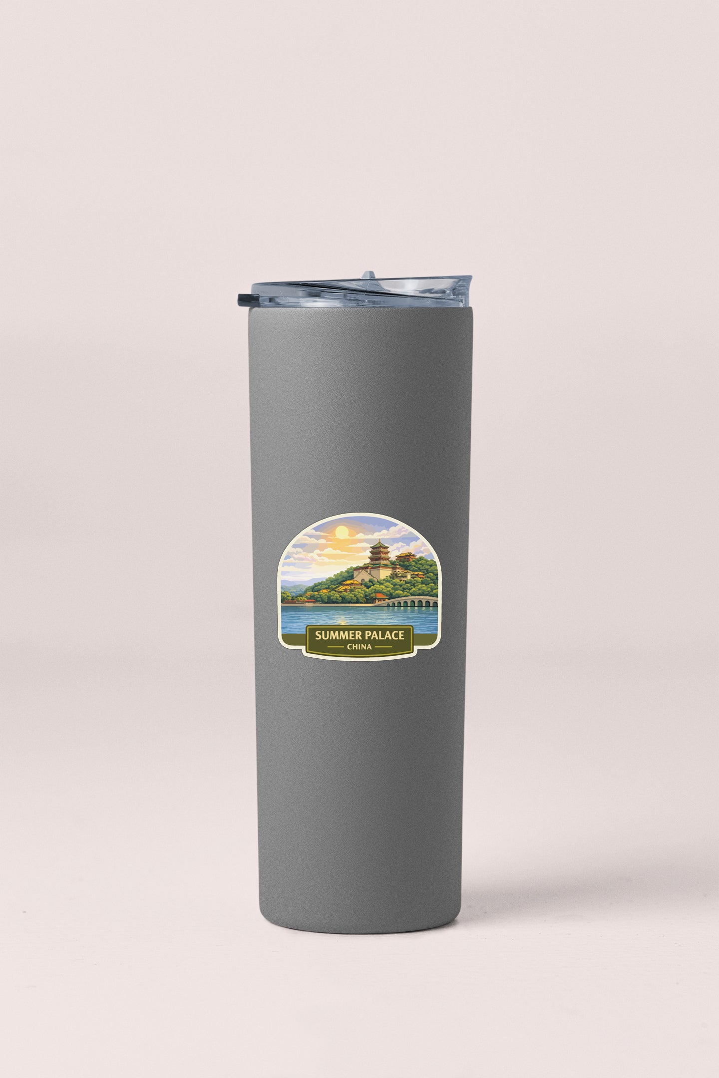 A gray insulated tumbler with a label depicting a scenic view of the Summer Palace in China.