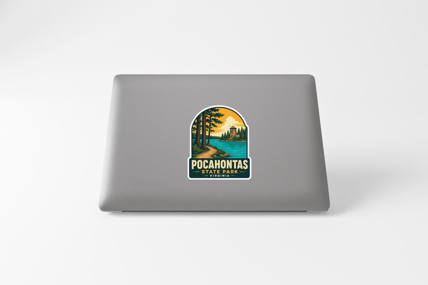 A sticker on the back of a laptop, depicting a scenic landscape with a lake and trees, along with the text "POCAHONTAS STATE PARK".