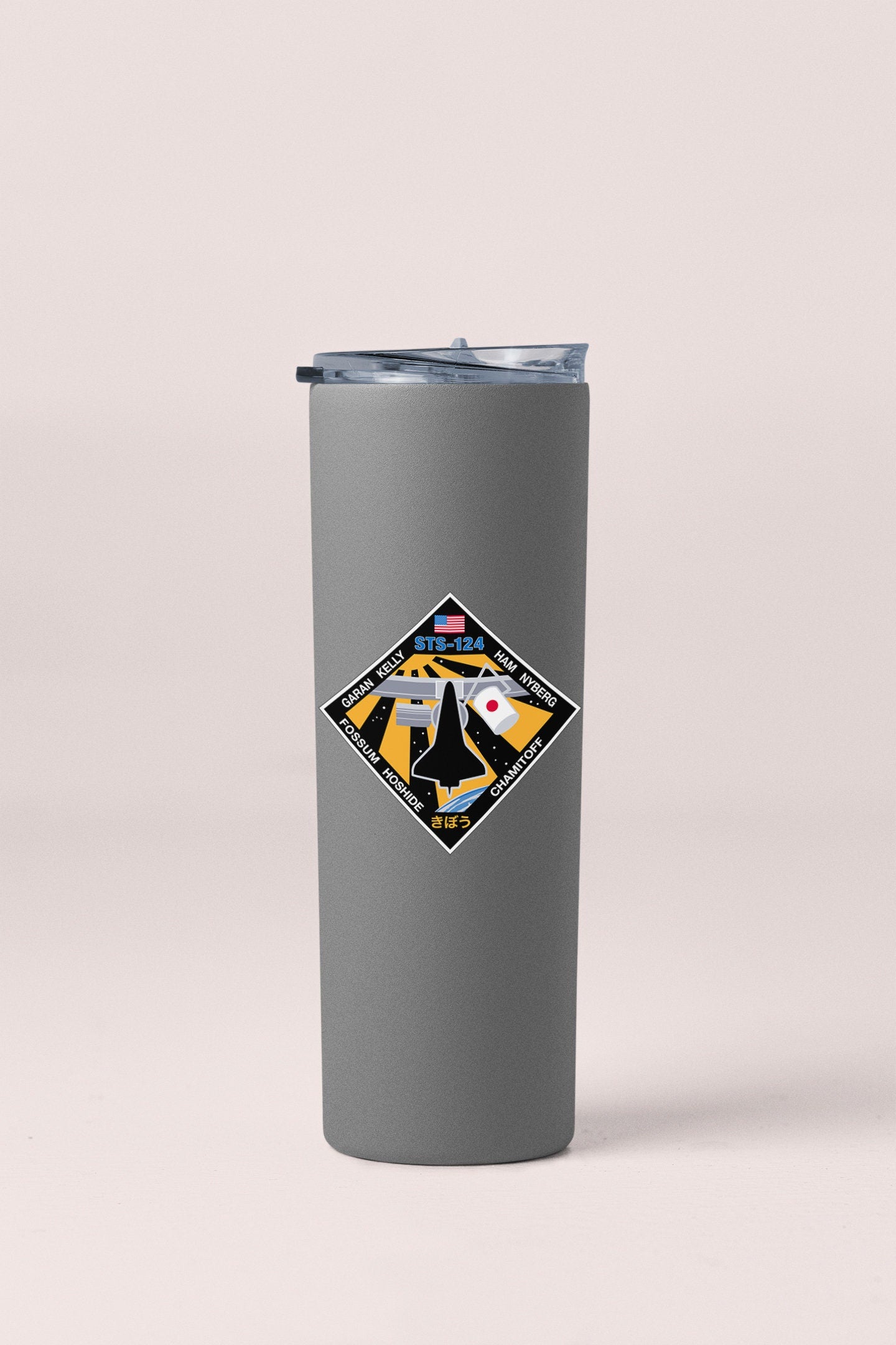 a stainless steel tumbler with a picture of a road