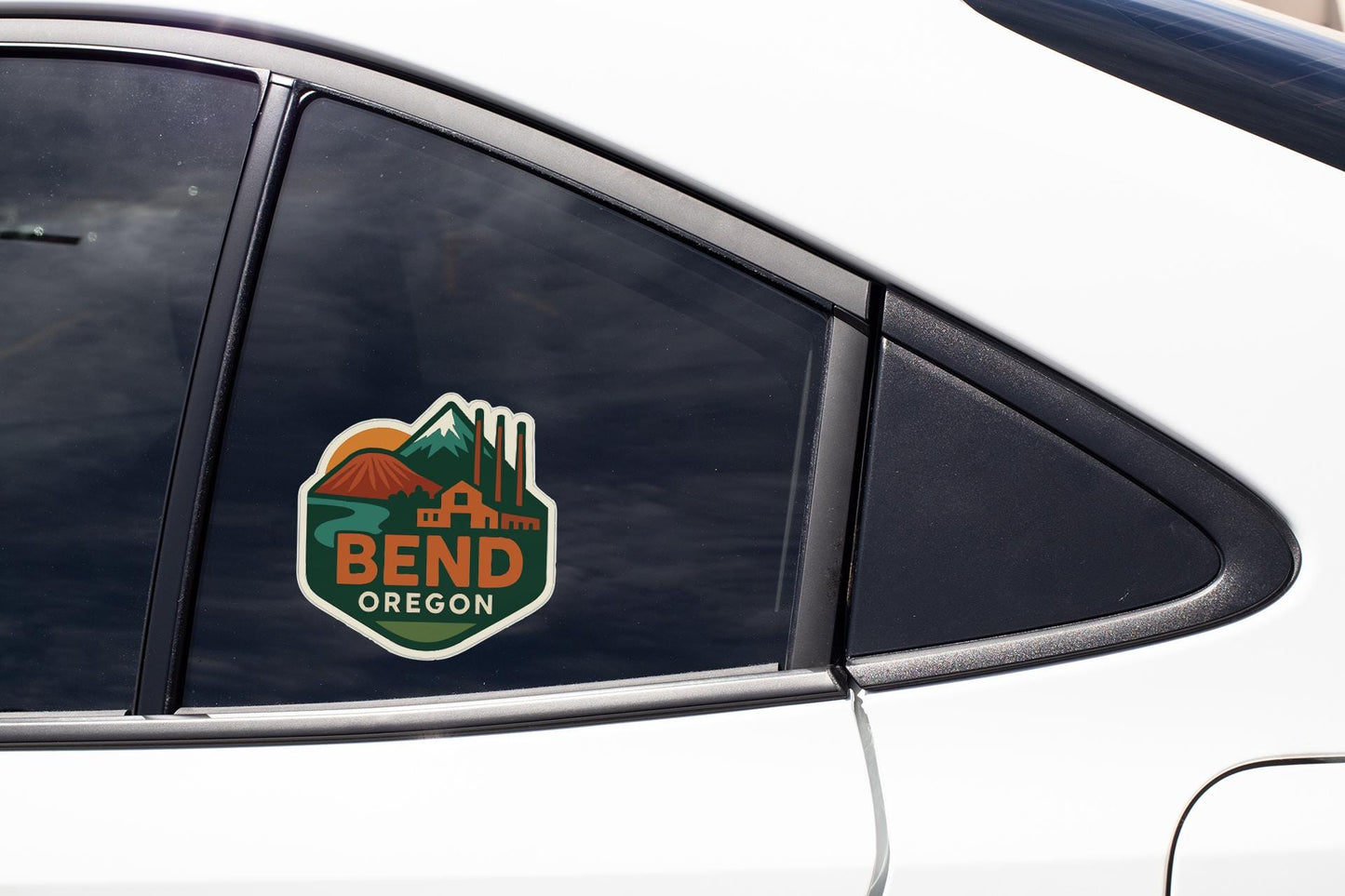 A sticker on the side of a car window that says "BEND OREGON".