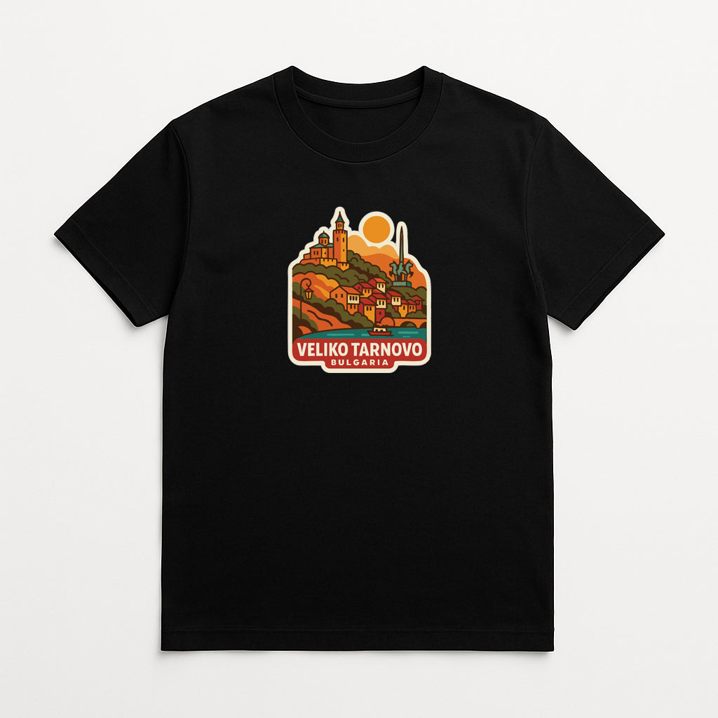 A black t-shirt with a graphic design depicting a scenic landscape with a castle, mountains, and a sun.