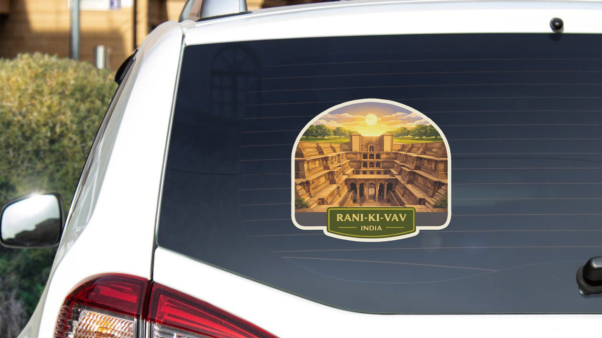 a sticker on the rear window of a car that displays a scenic image of a temple or monument, along with the text "RANI-KI-VAV INDIA".