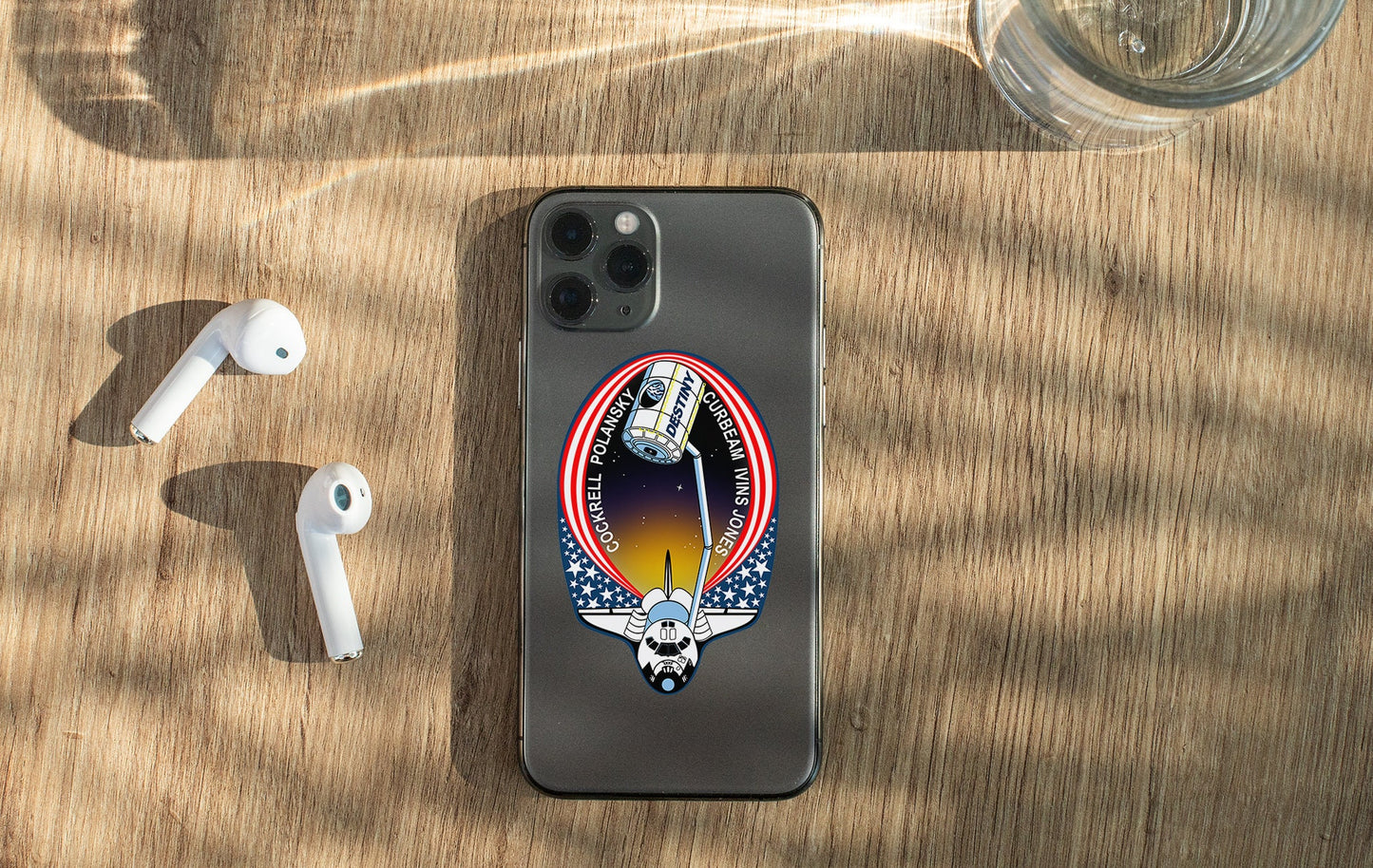 an iphone case with a picture of a space shuttle on it