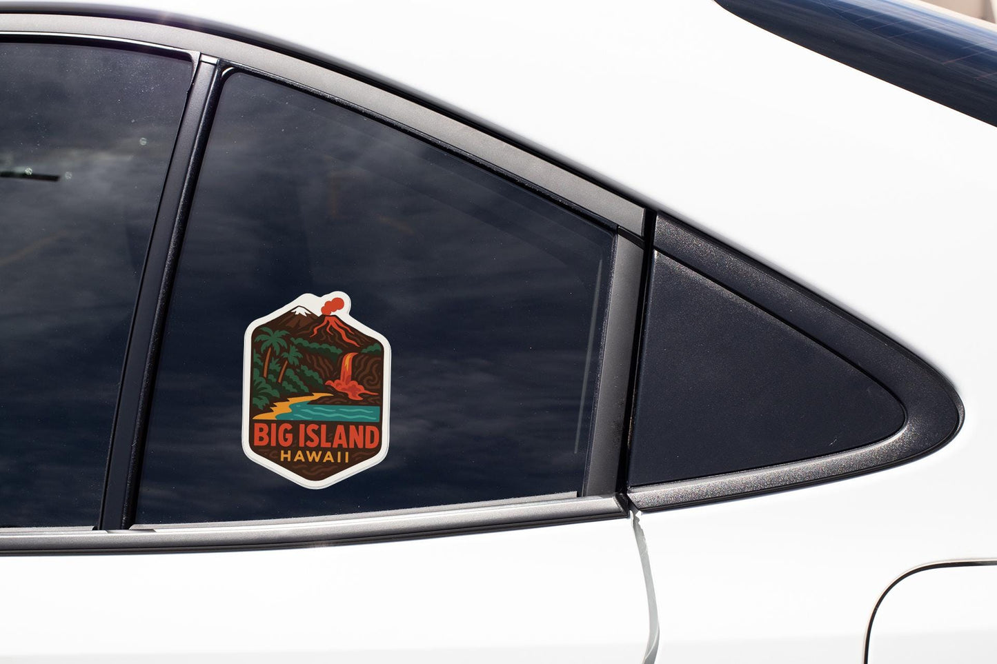 A sticker on the side of a car window that says "BIG ISLAND HAWAII".