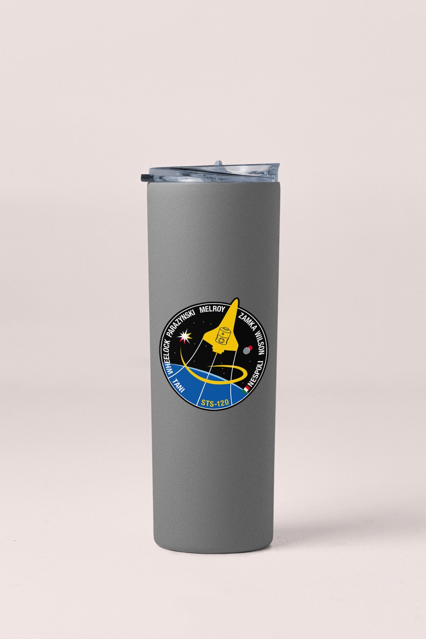 a stainless steel tumbler with a nasa emblem on it