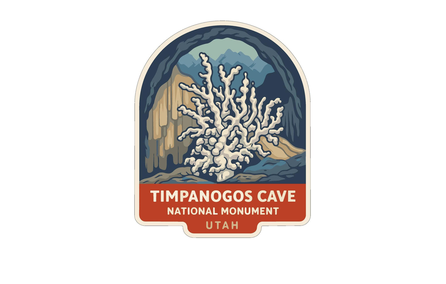 a sticker or label with an illustration of a cave and mountains, along with the text "Timpanogos Cave National Monument Utah".