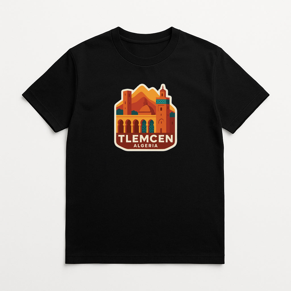 A black t-shirt with a graphic design depicting a cityscape and the text "TLEMCEEN ALGERIA" printed on it.