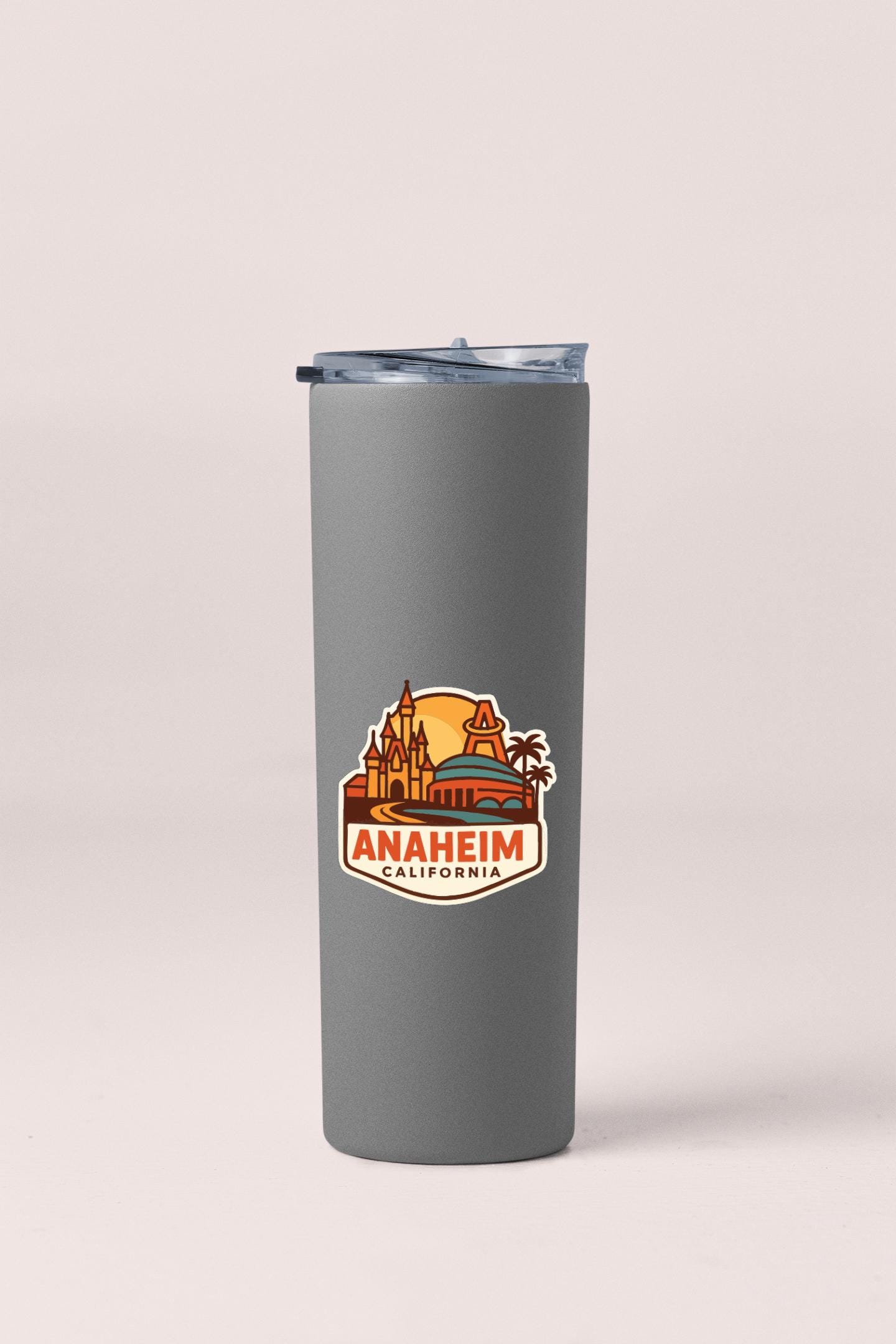 A gray insulated tumbler with a logo of Anaheim, California on it.