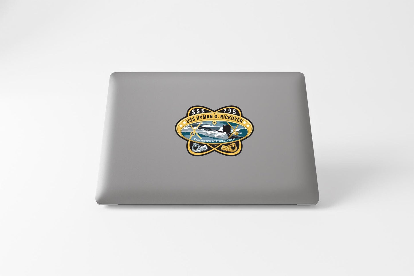 a laptop computer with a sticker on it