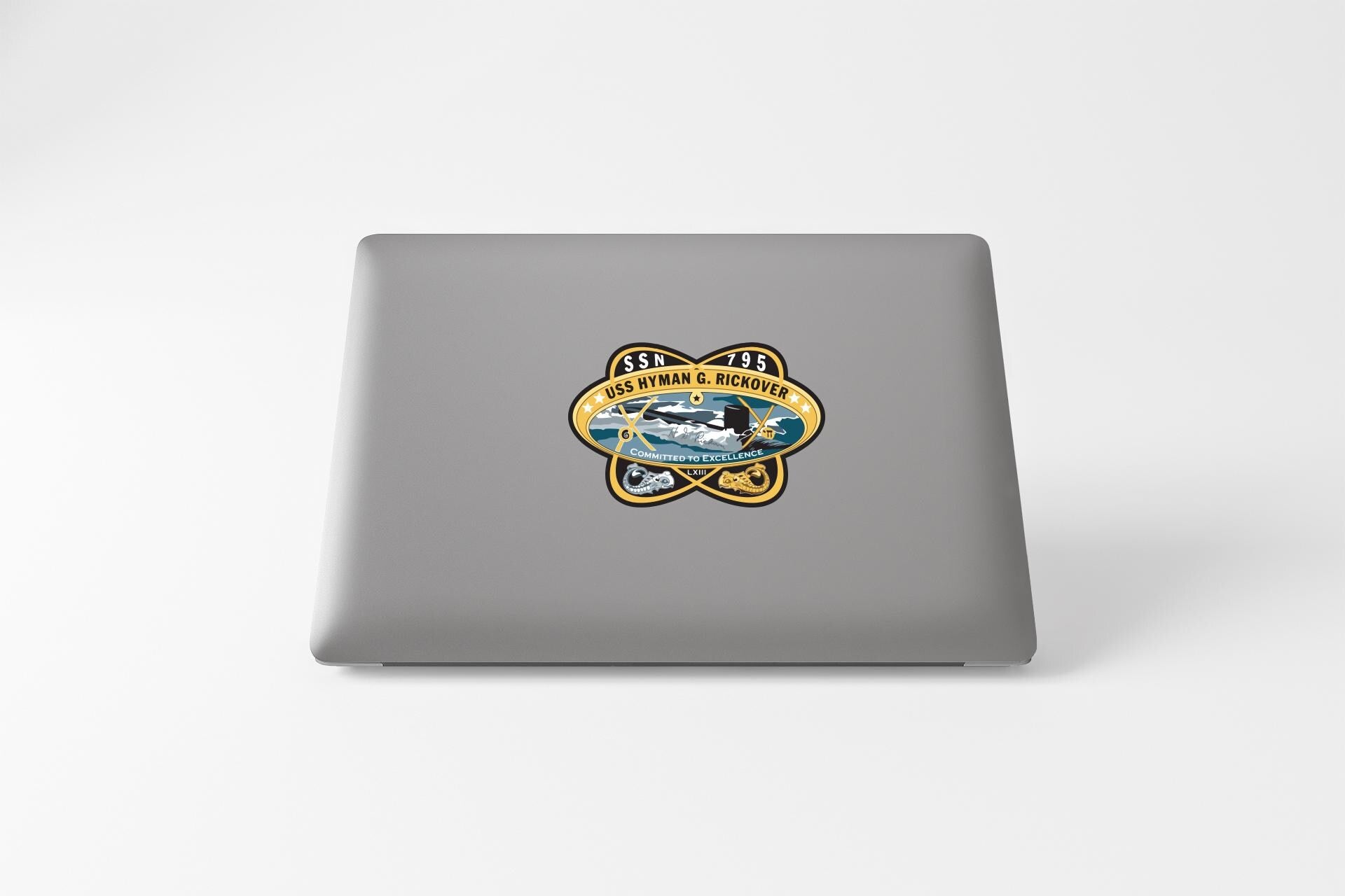 a laptop computer with a sticker on it