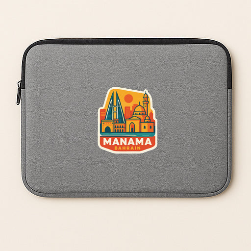 A gray laptop sleeve with a colorful sticker of the city of Manama, the capital of Bahrain, printed on it.