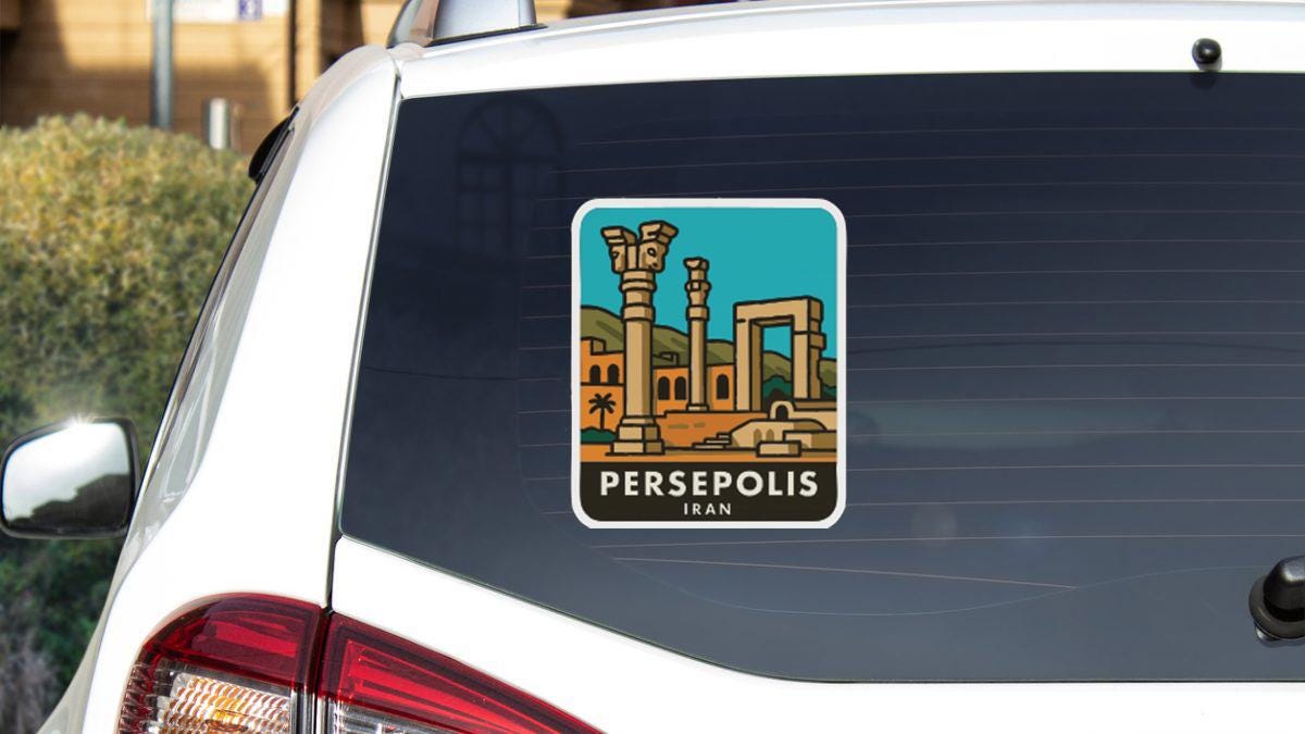 A sticker on the rear window of a car, depicting the city of Persepolis, Iran.