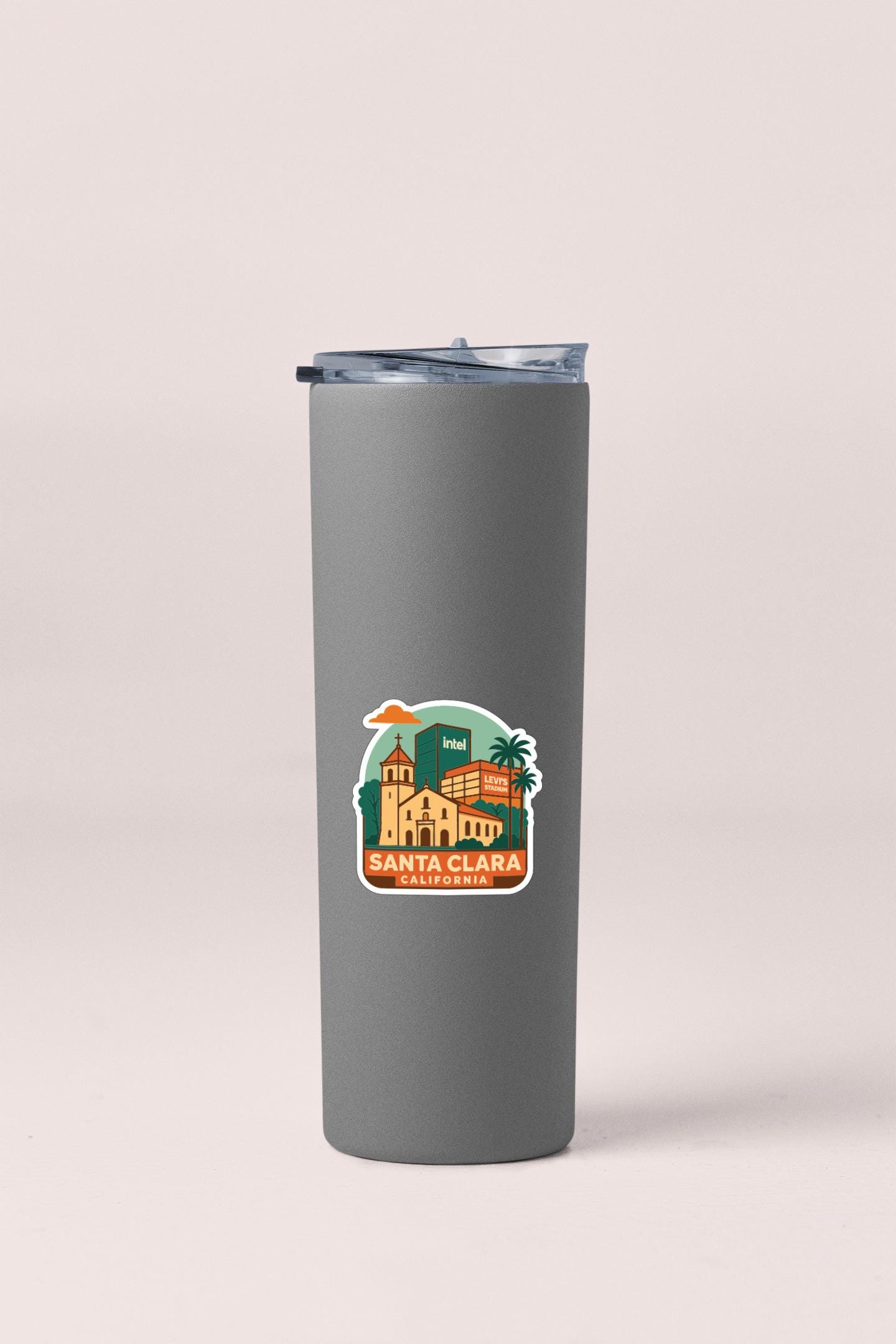 A gray insulated tumbler with a sticker depicting Santa Clara, California.
