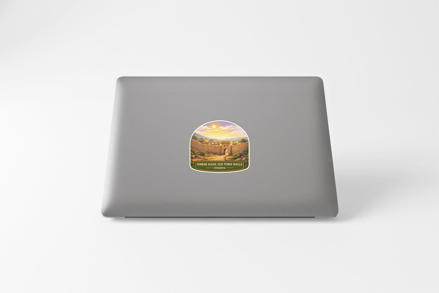 A sticker on the back of a laptop computer.