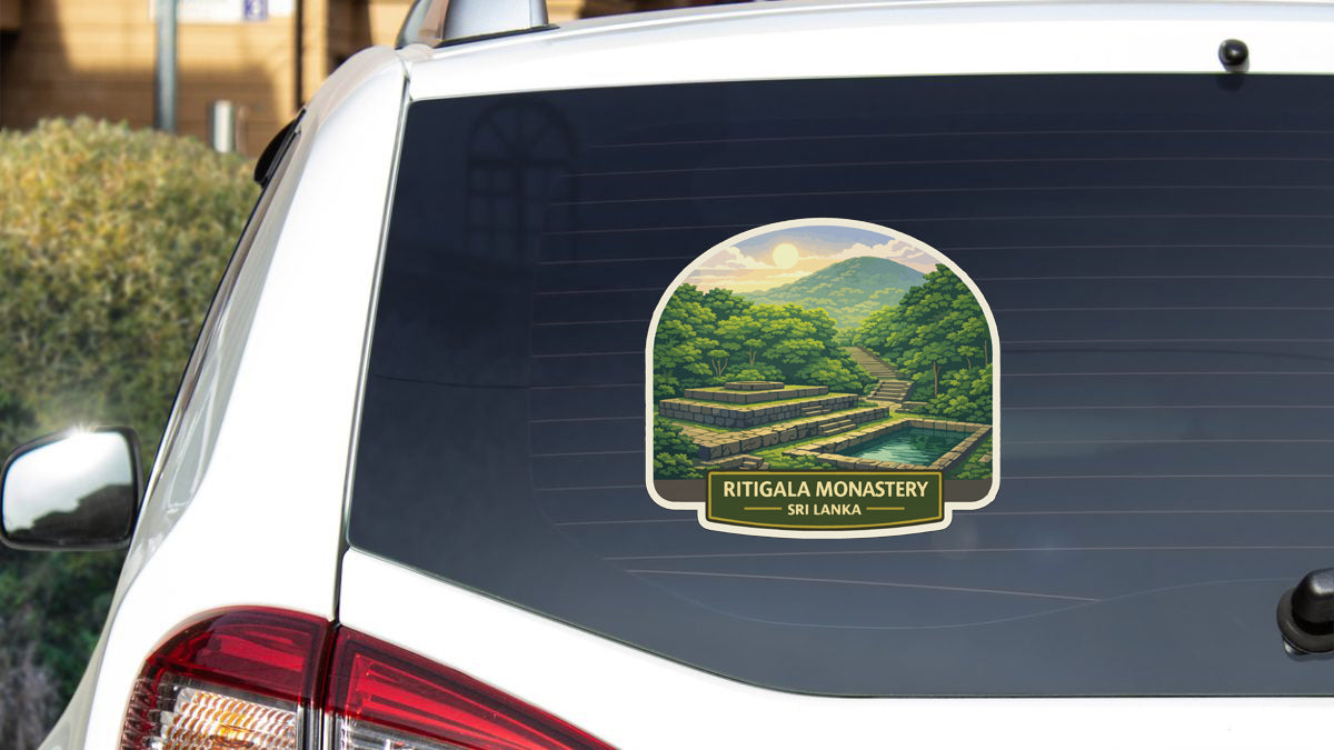 A sticker on the rear window of a car, depicting a scenic landscape with a temple in the background.