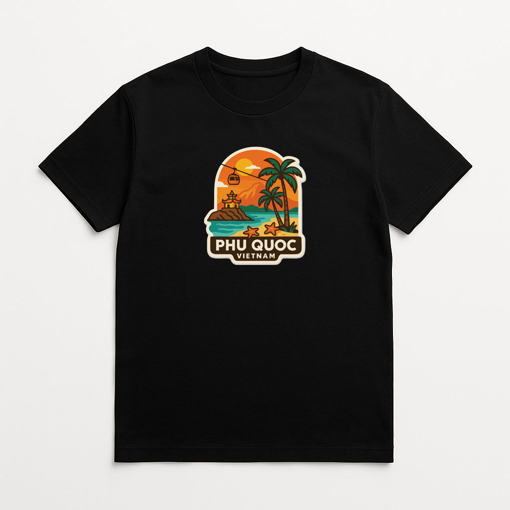 A black t-shirt with a graphic design depicting a tropical beach scene with palm trees, a sunset, and a boat.