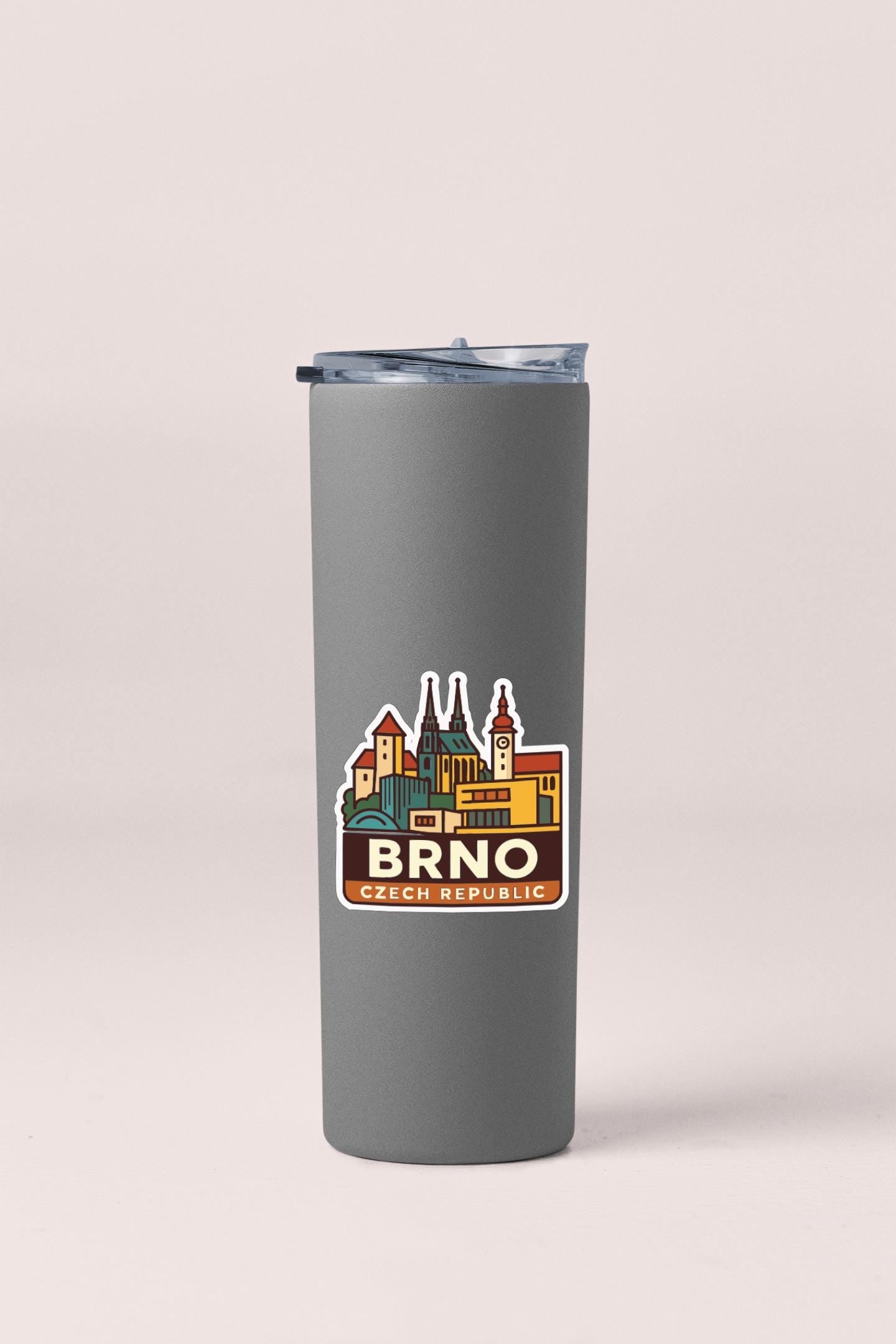 A gray insulated tumbler with a sticker depicting the Czech Republic.