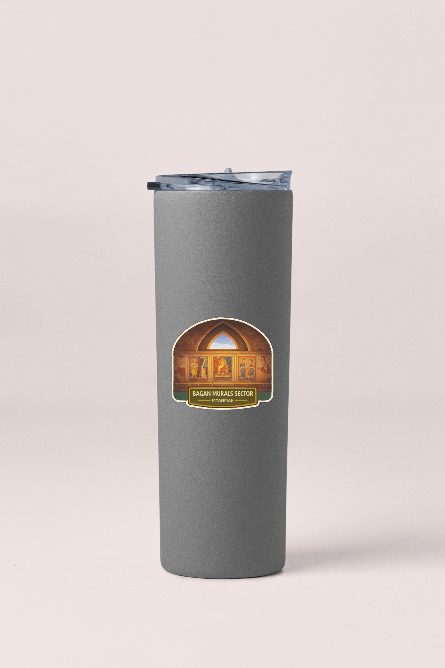 A gray cylindrical container with a label that reads "BAGAN MURALS SECTOR" and an image of a mural.