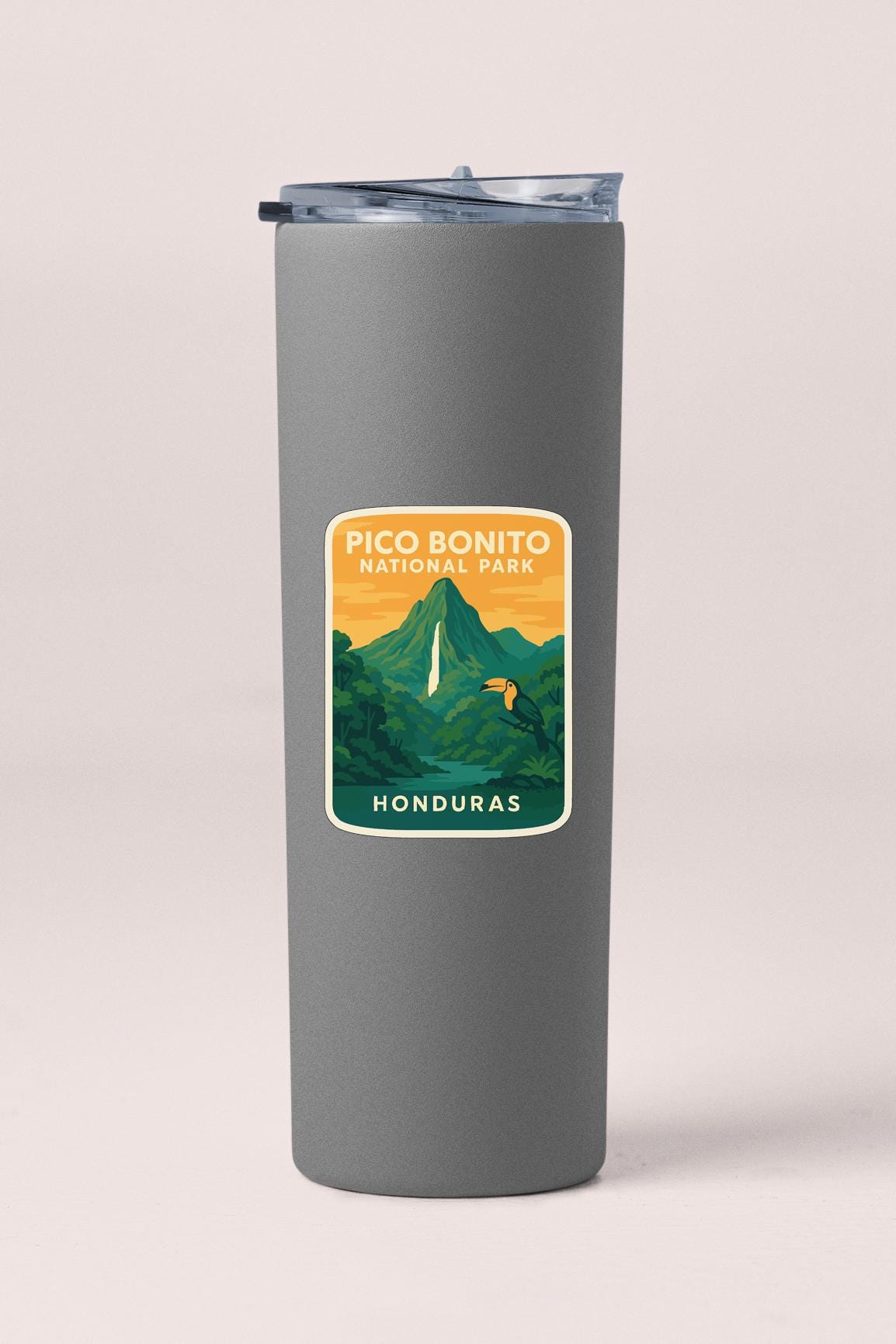 A gray insulated tumbler with a label that says "PICO BONITO NATIONAL PARK HONDURAS".