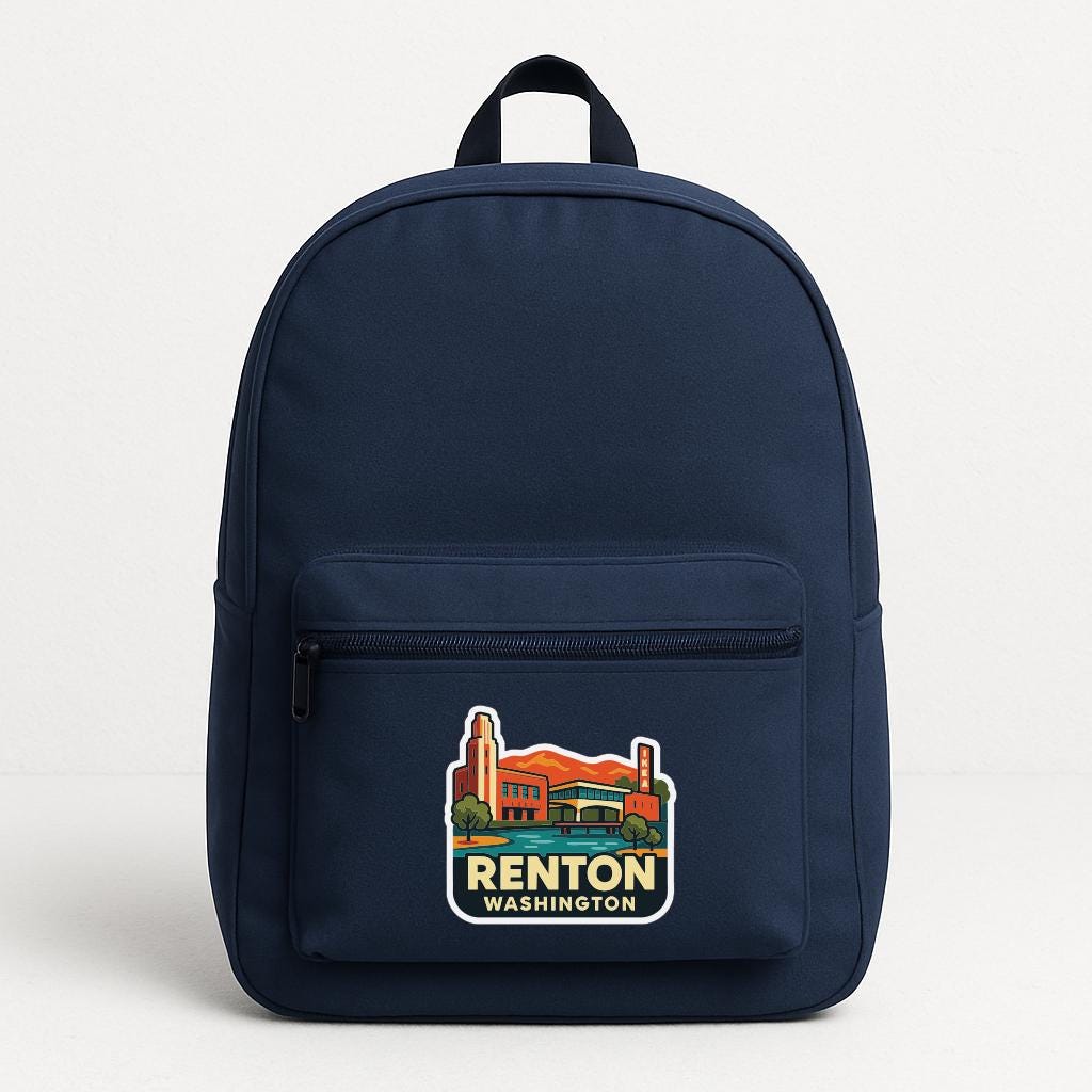 A navy blue backpack with a sticker on the front that says "RENTON WASHINGTON".