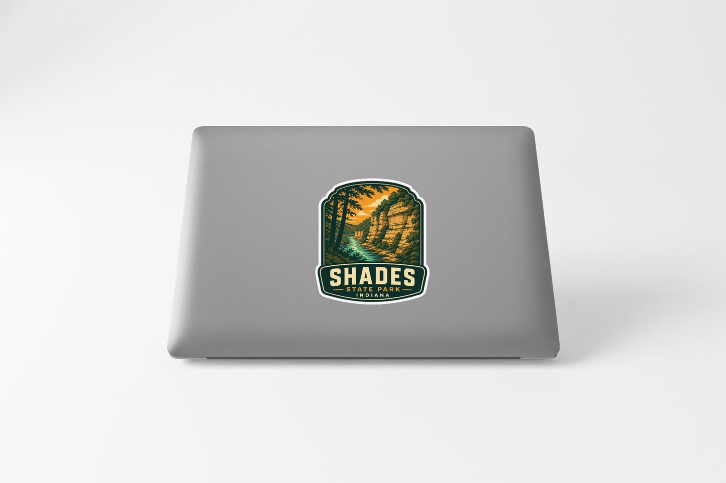 a sticker with a tropical landscape on a laptop.
