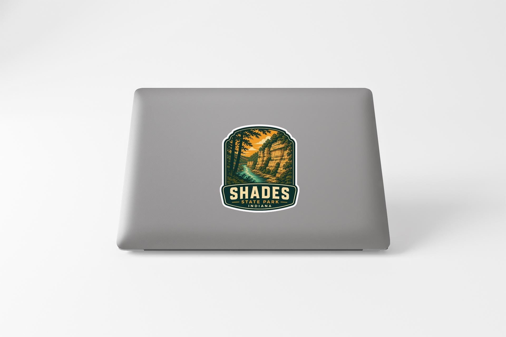 a sticker with a tropical landscape on a laptop.