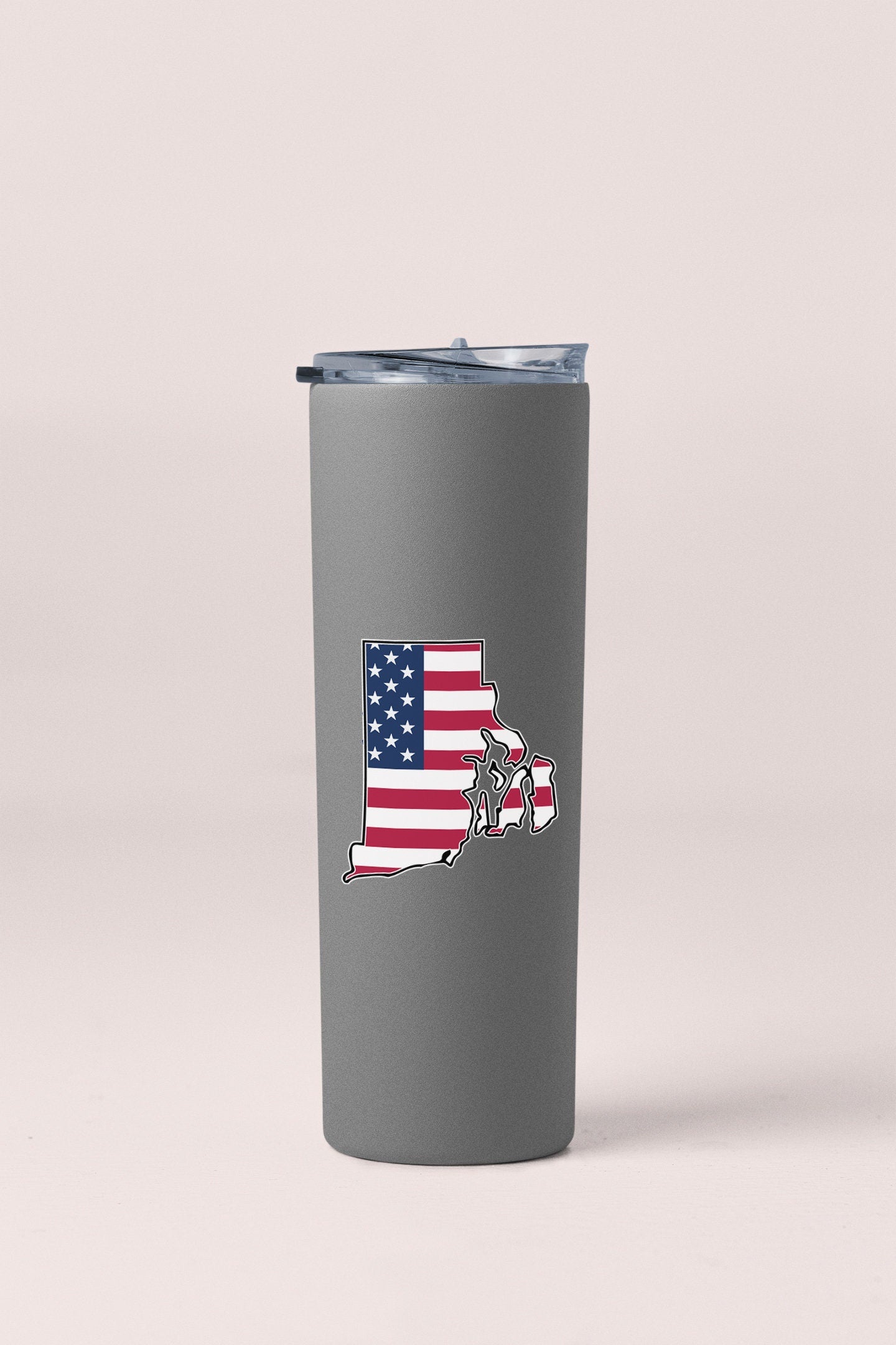 a stainless steel tumbler with the state of texas painted on it